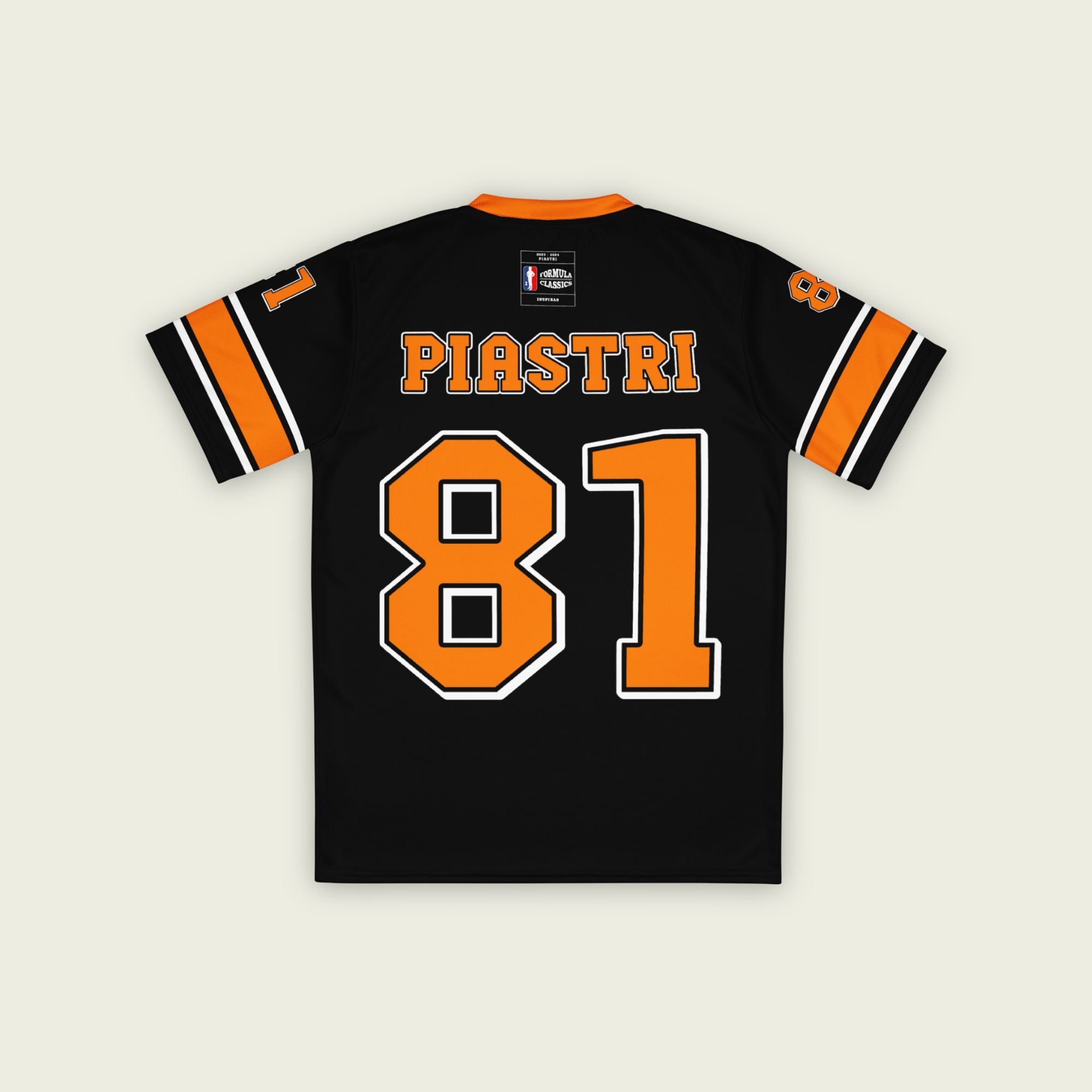 A black and papaya orange football jersey with Oscar Piastri McLaren F1 Racing number 81 in papaya orange on the front and back. The name Piastri is in orange on the front and back.