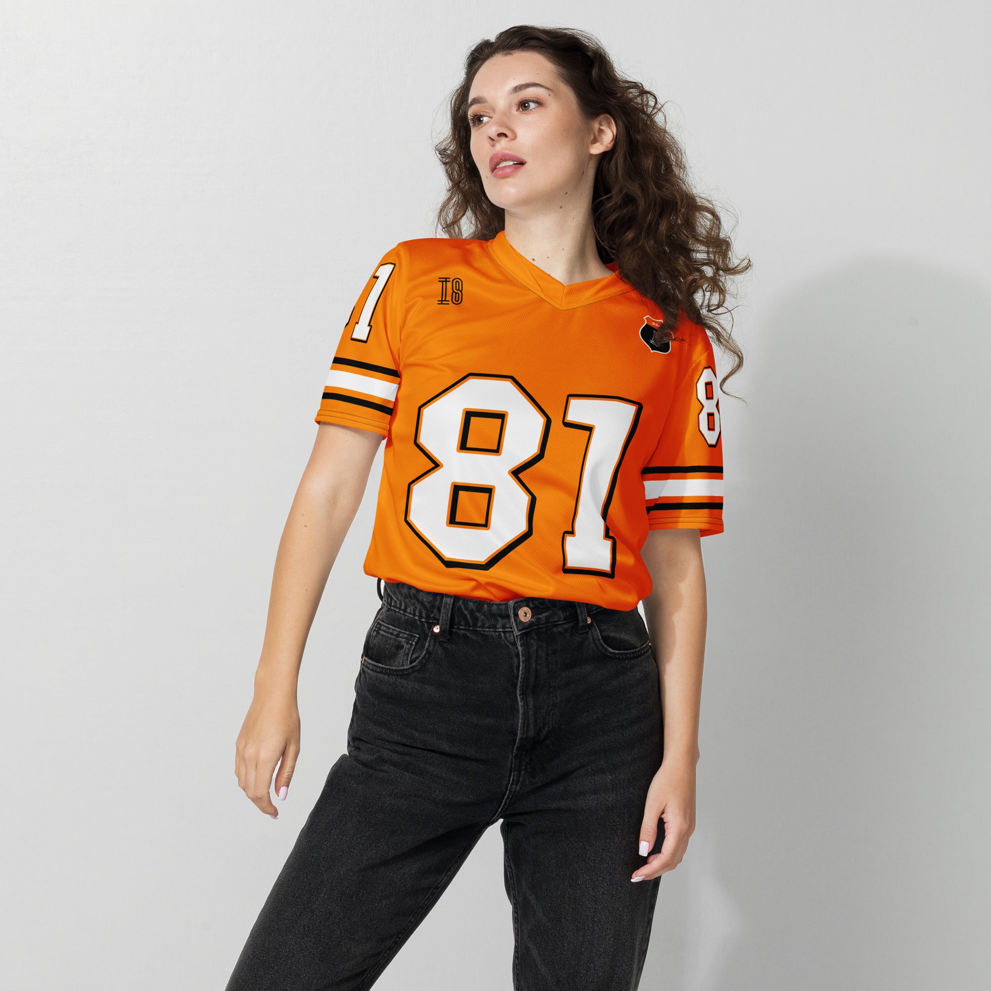 A papaya orange football jersey with Oscar Piastris McLaren  F1 Racing number 81 on the front and back.
