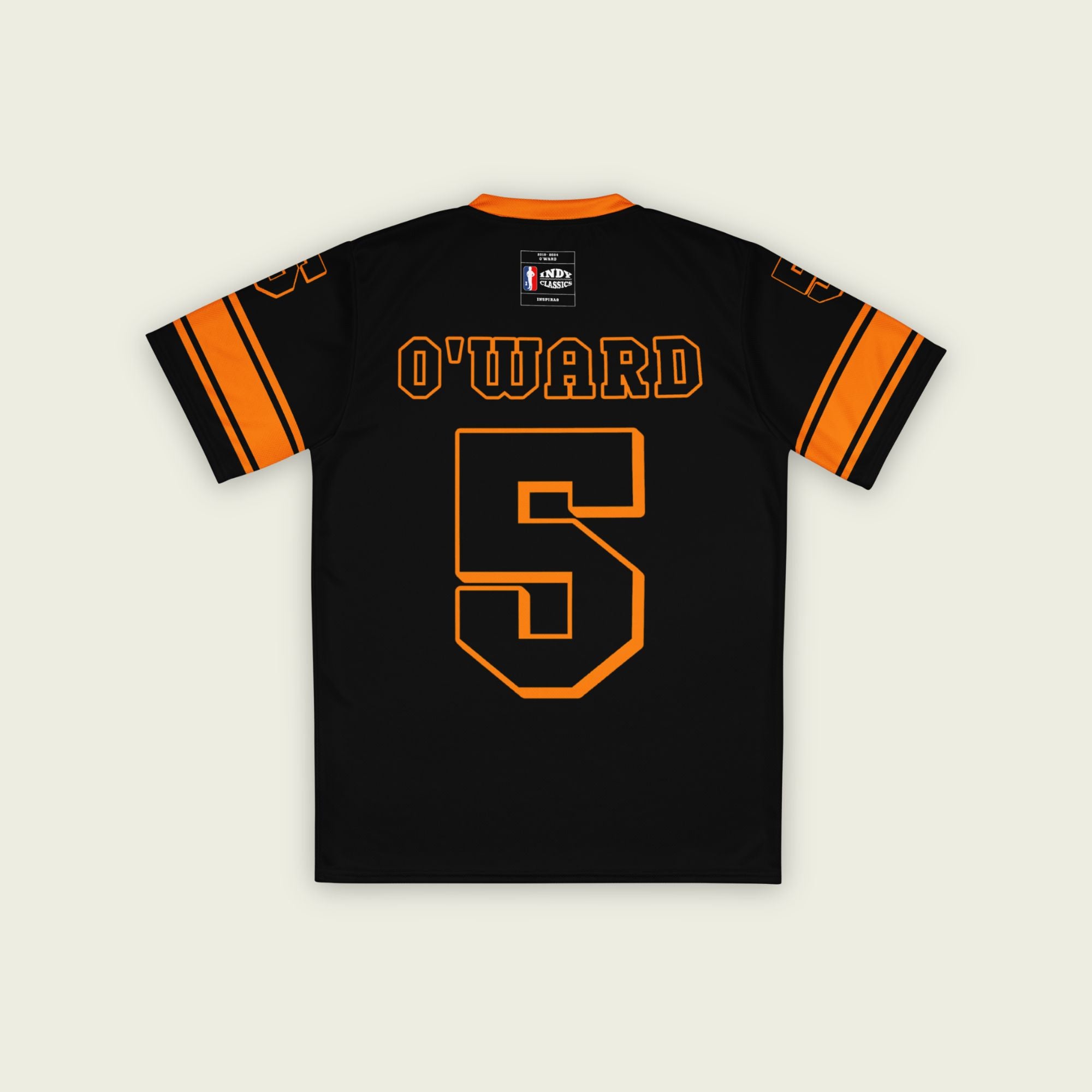 A black and orange football jersey with Pato O'Wards Arrow McLaren Indycar racing number 5 in orange. It has the name O'Ward on the front and back in orange as well.