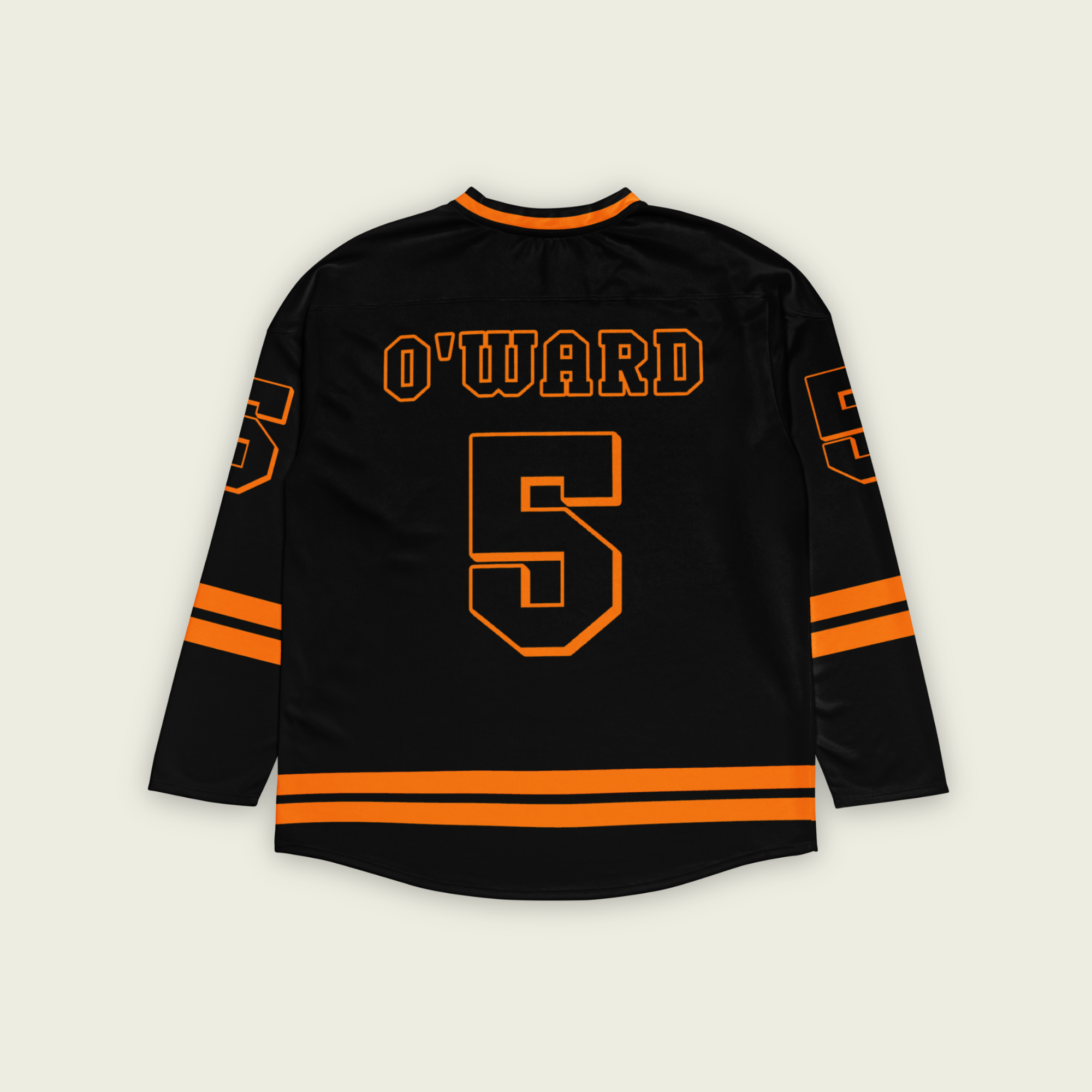 A black hockey jersey with Pato Owards name and indycar racing number 5 on the front and back in orange.
