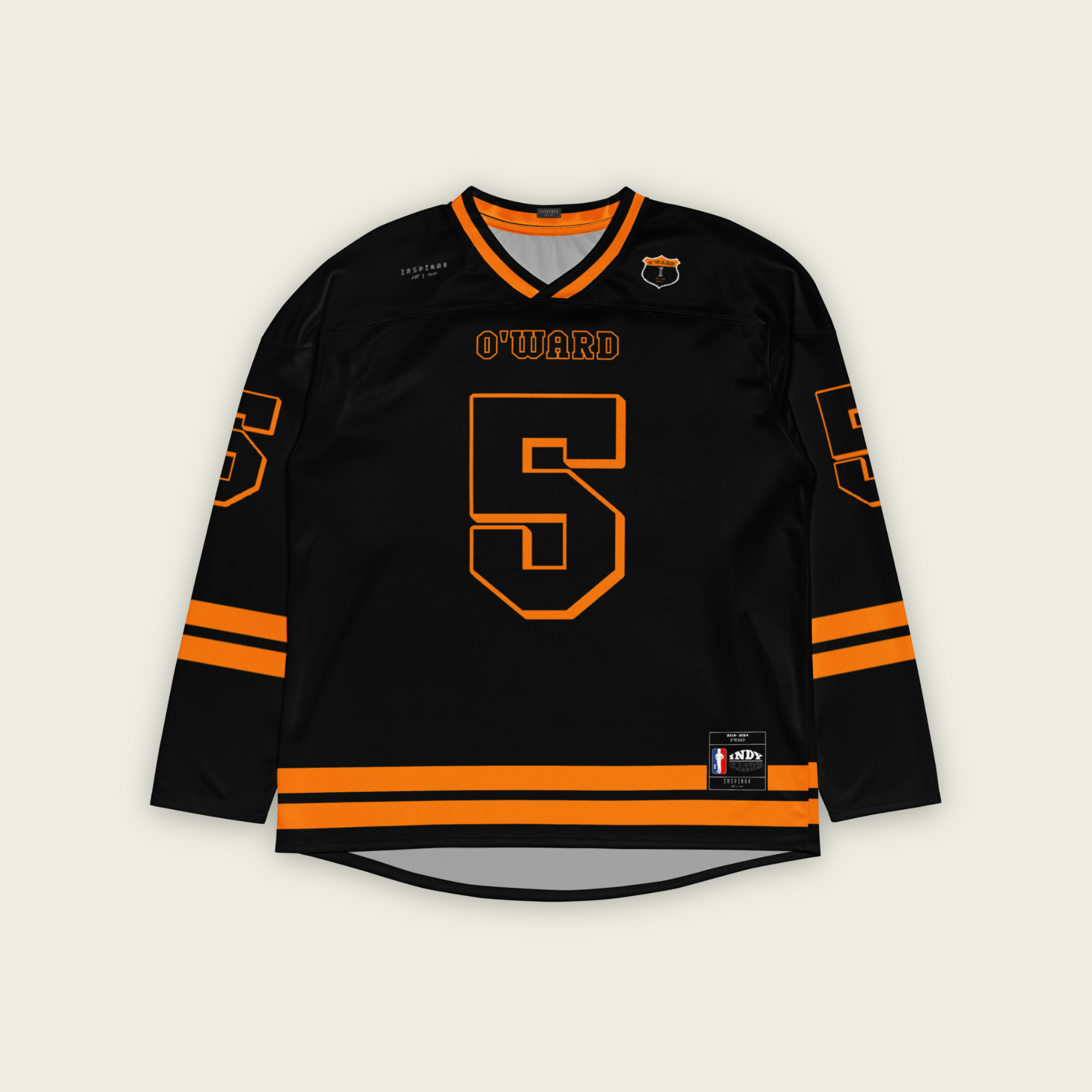 A black hockey jersey with Pato Owards name and indycar racing number 5 on the front and back in orange.