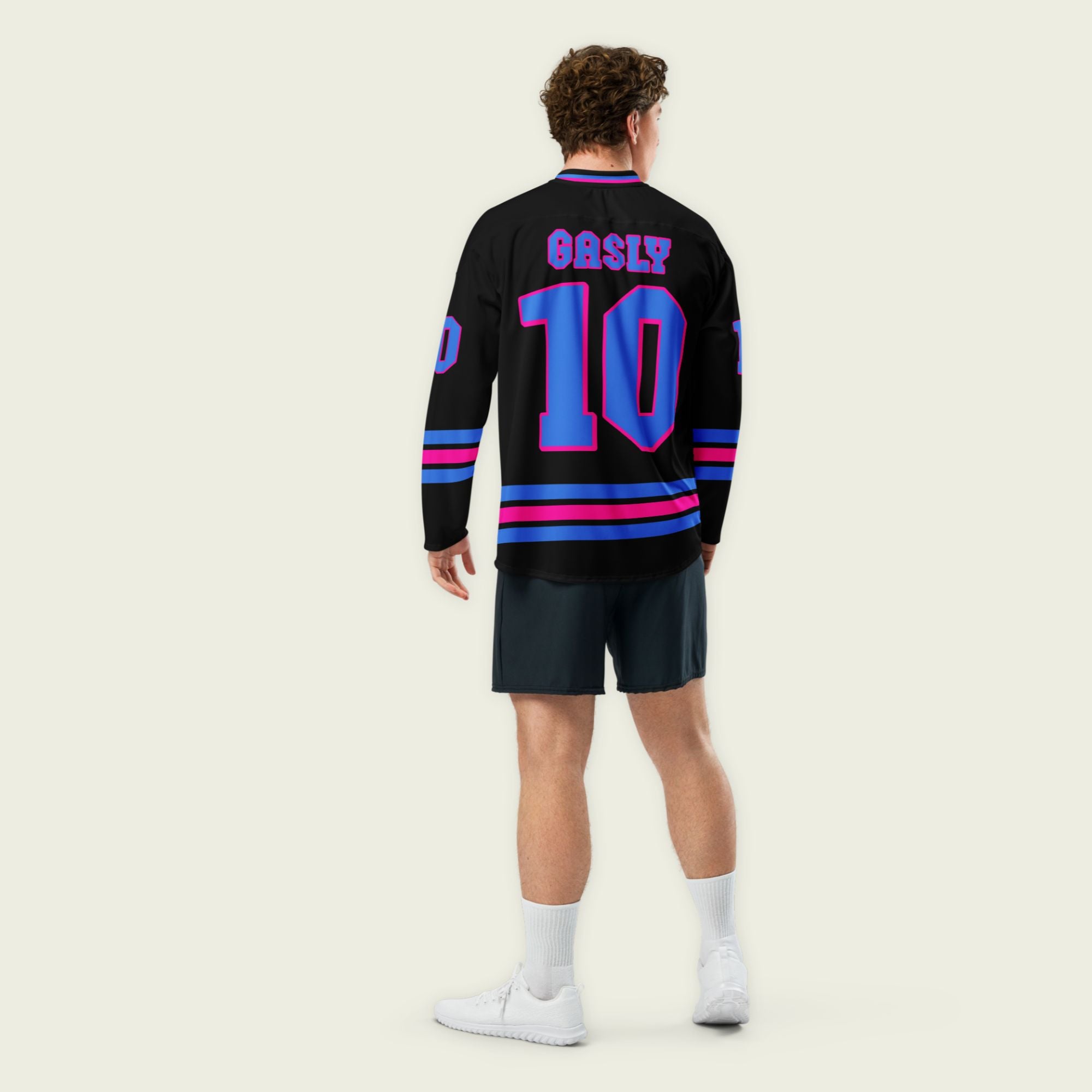 A black hockey jersey with three lines 2 blue and the middle one pink at the bottom both on the front and back, also the arms. there is a blue number 10 that pierre gasly races in F1 on the front and back with a pink outline. and his name Gasly on the front and back