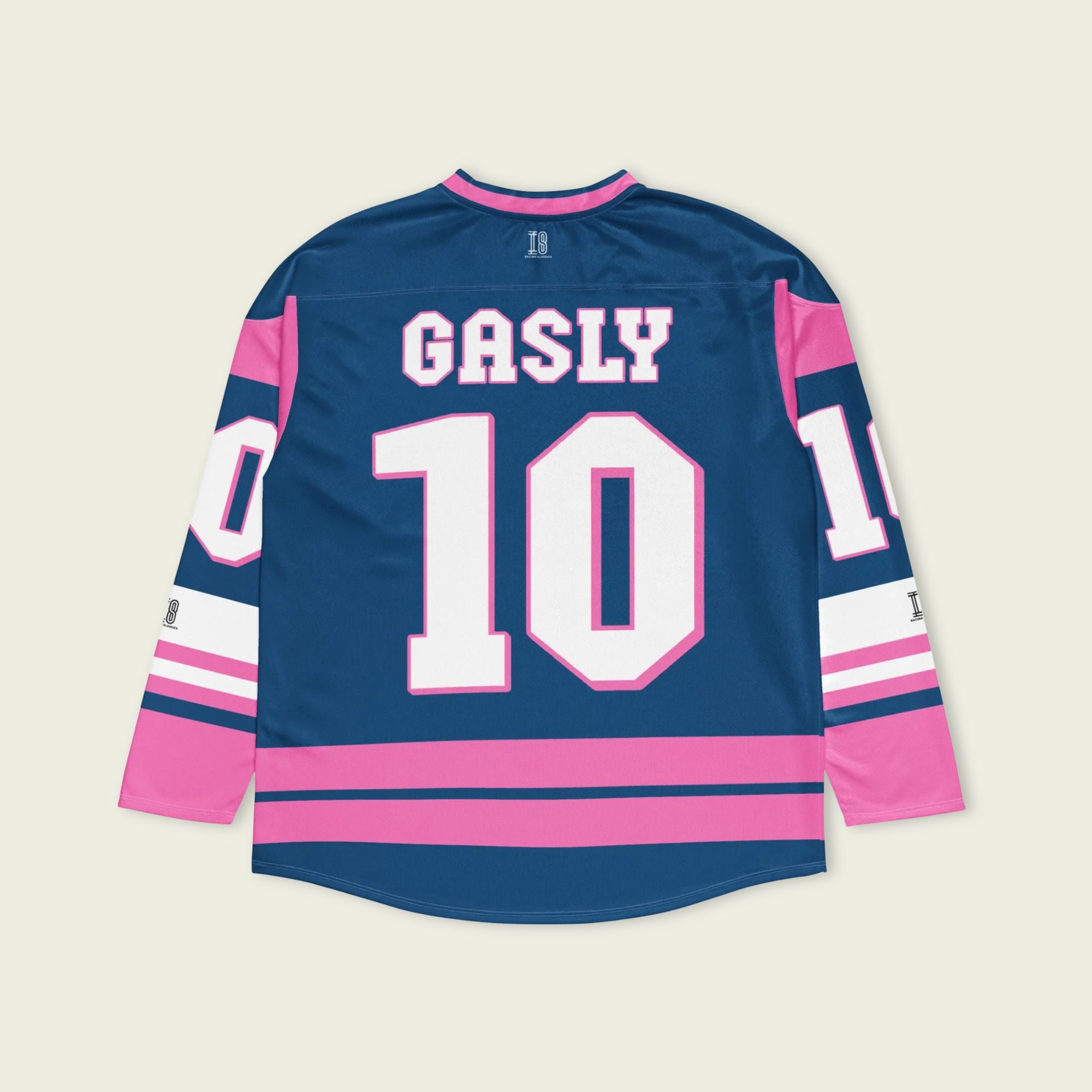 A blue, and pink hockey jersey with Pierre Gasly's F1 2025 Alpine racing number 10 on the front and back in white. The name Gasly in white is on the front and back.