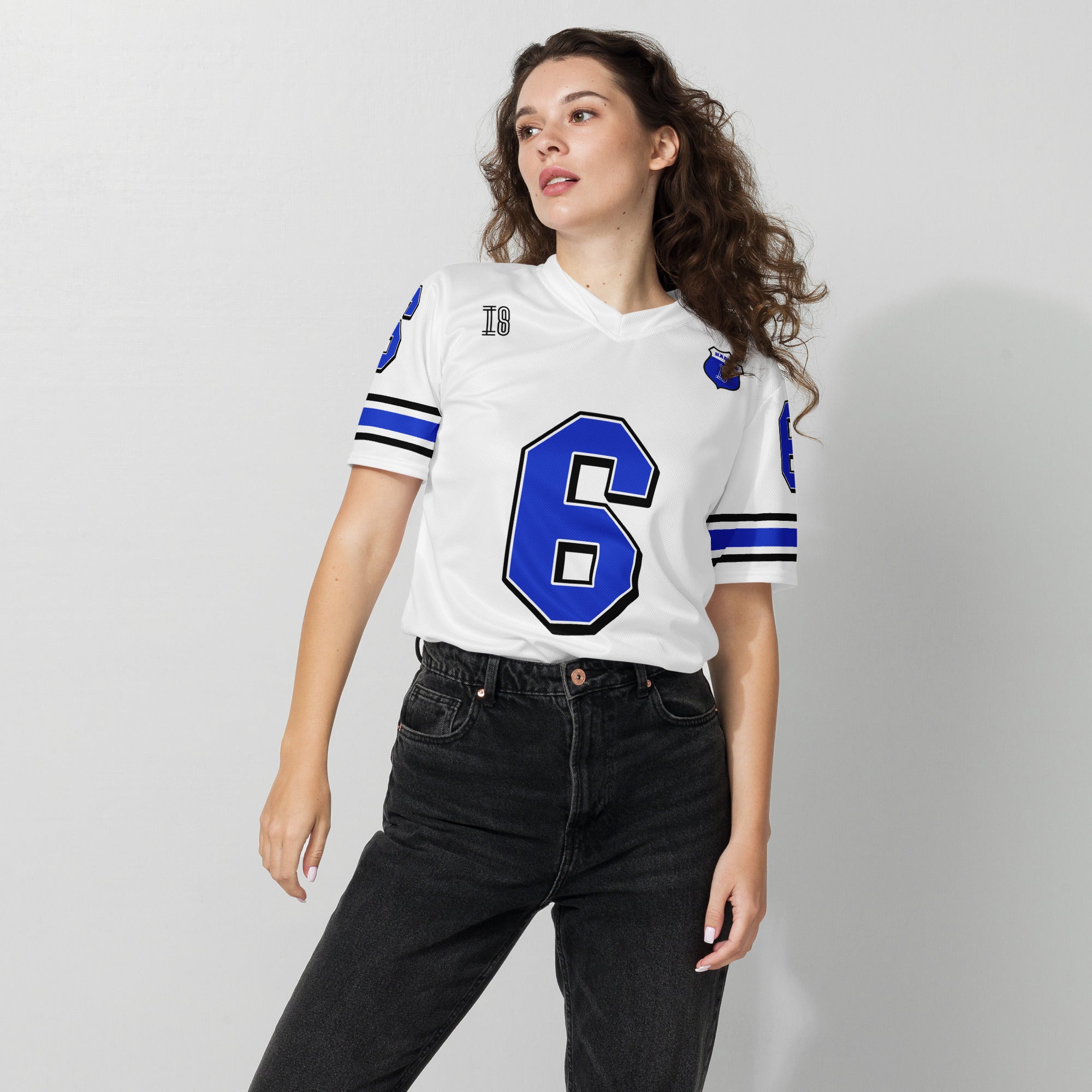 A white and blue football jersey with Isack Hadjars Redbull F1 Racing number 6 on the front and back.