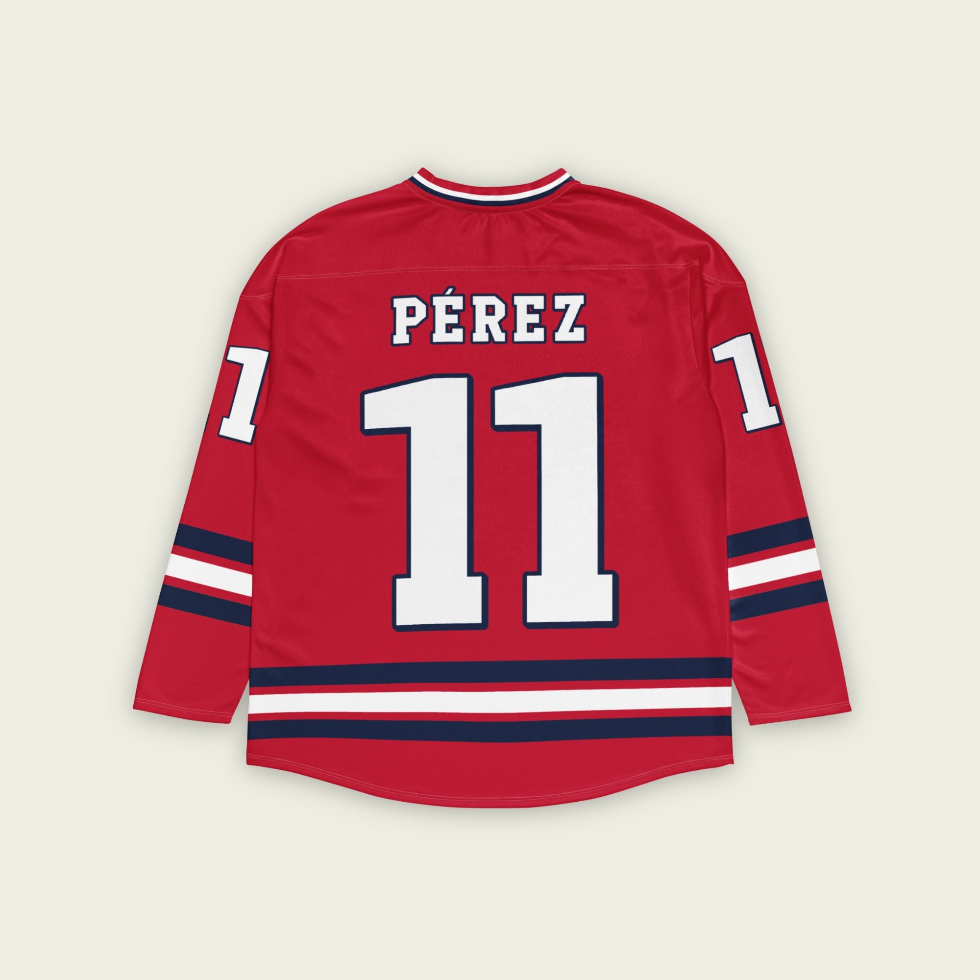 A red hockey jersey with Sergio Perez's Rebull F1 racing number 11 on the front and back in white, also the name Perez is on the back and front in white.