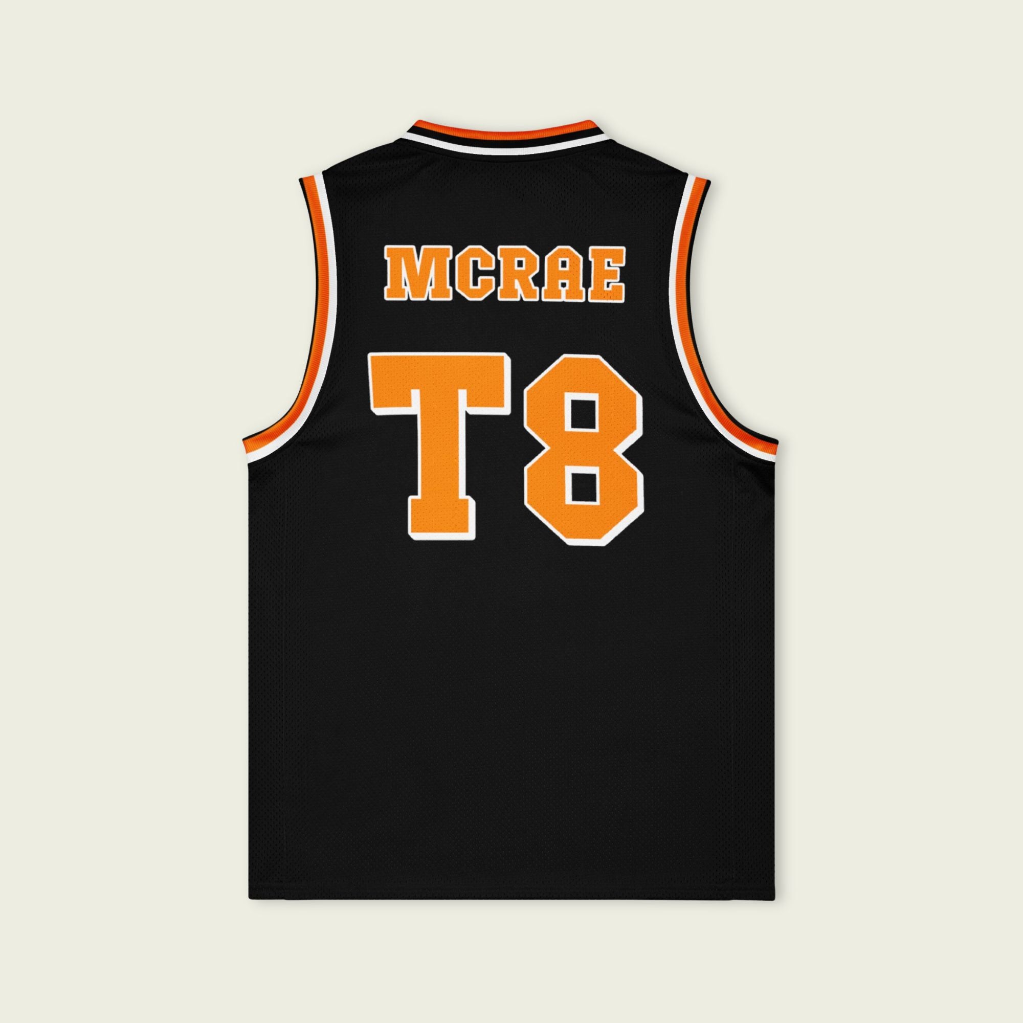 A black and orange pin striped basketball Jersey with T8 Tate Mcrae on the front and back in white.