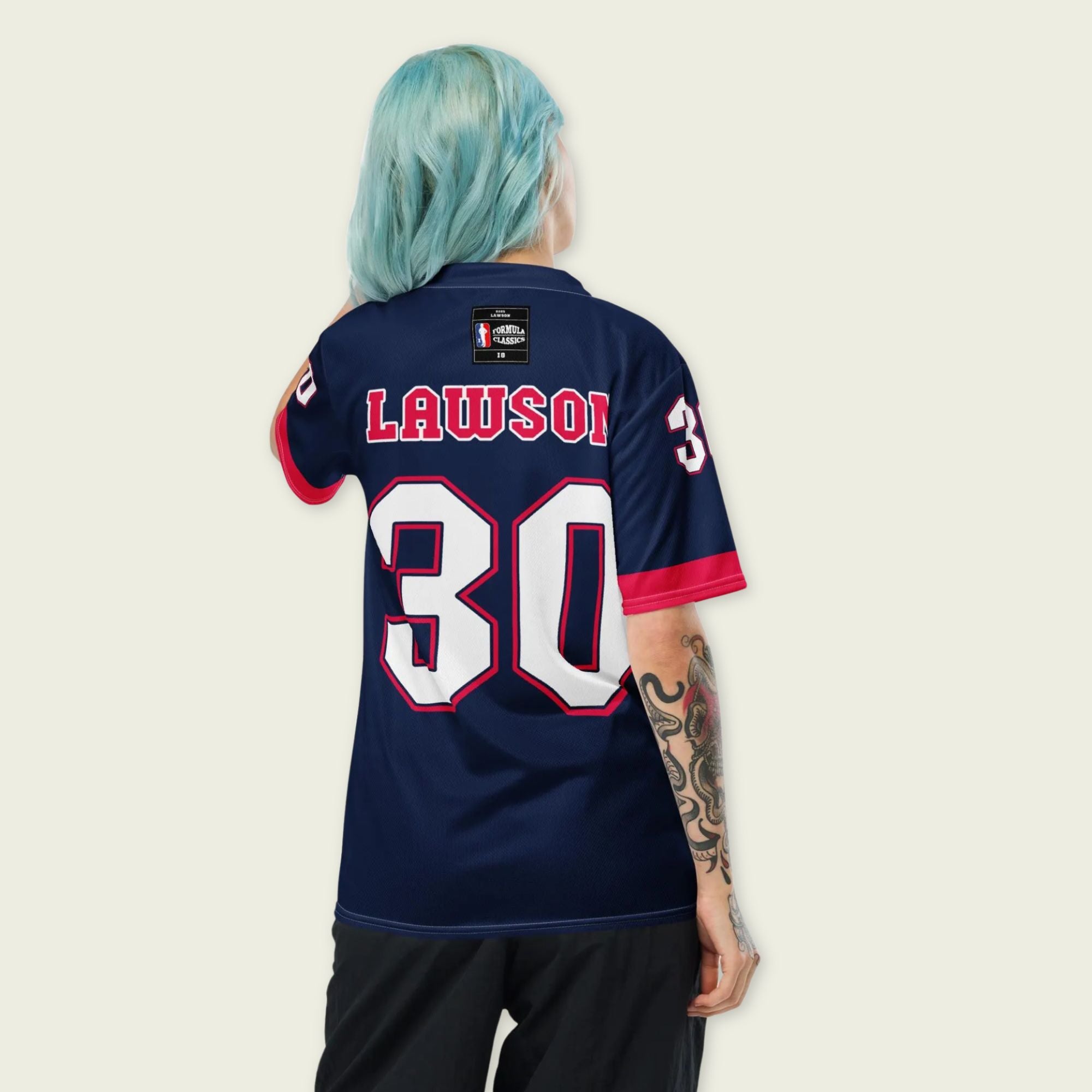 A navy blue and red football jersey with Liam Lawson's Redbull  F1 racing number 30 on the back and front in white. It has the name Lawson in white on the front and back as well.