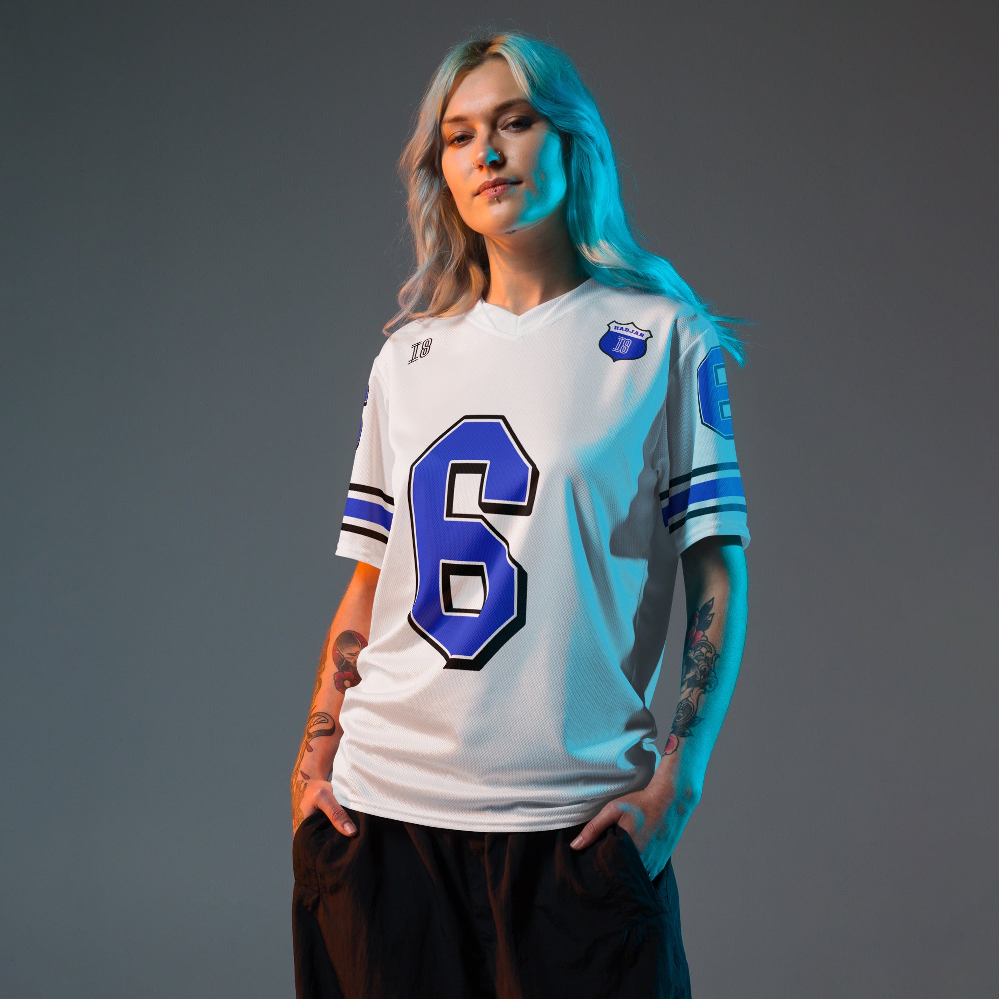 A white and blue football jersey with Isack Hadjars Redbull F1 Racing number 6 on the front and back.