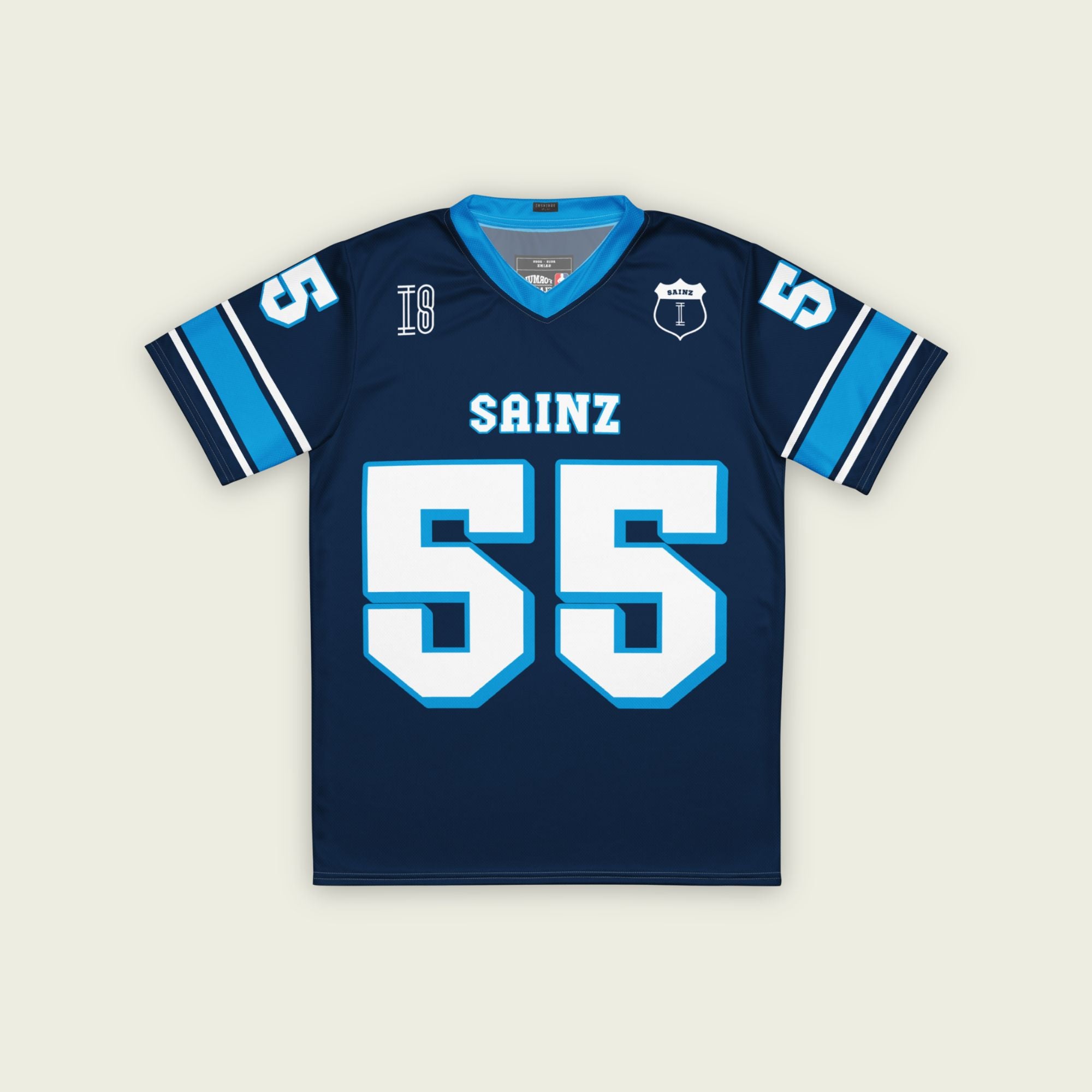 A navy blue football jersey with Carlos Sainz Jnr's WIlliams F1 racing number 55 on the back and front in white with a light blue outline.