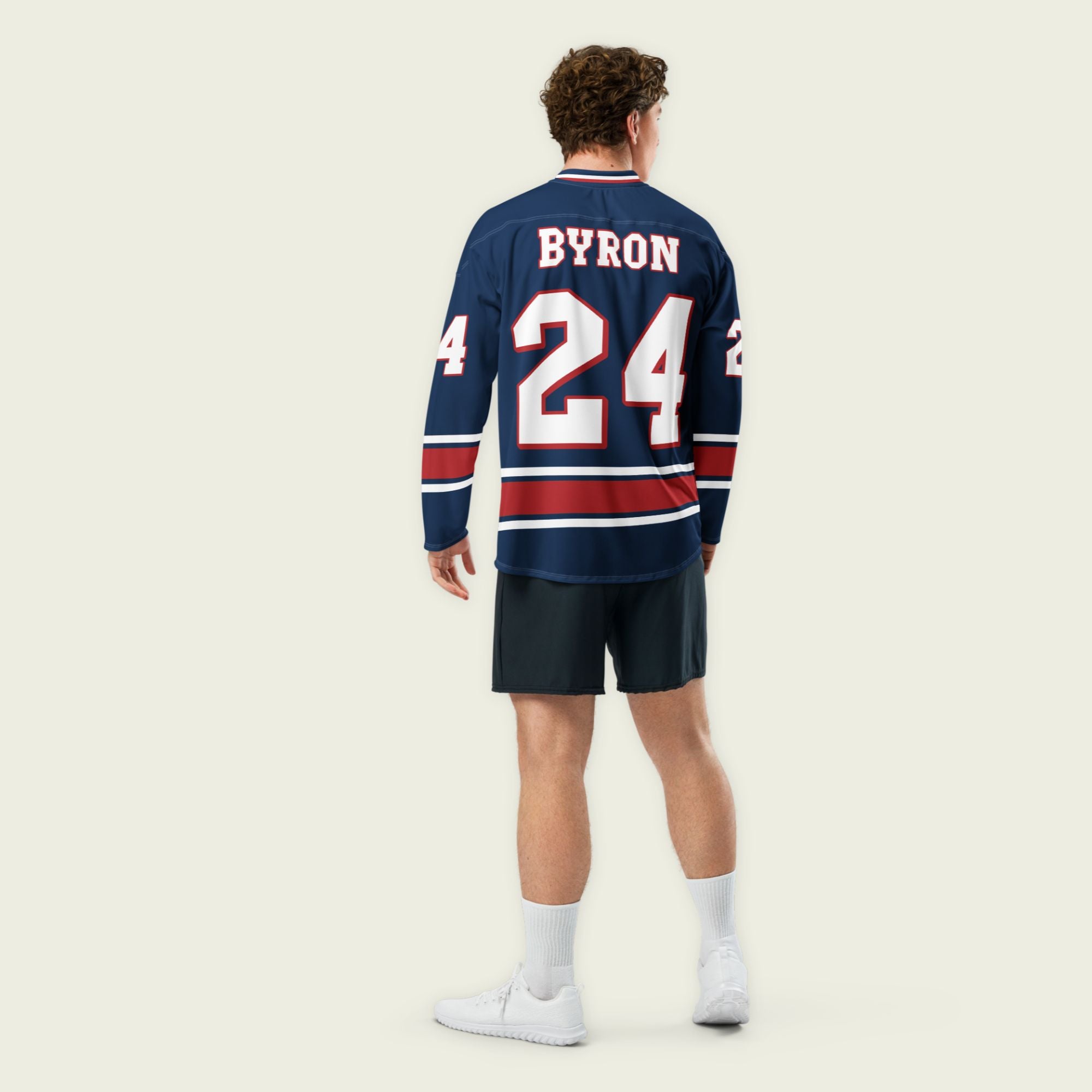 A navy, white, and red hockey jersey with William Byron's Nascar number 24 displayed
