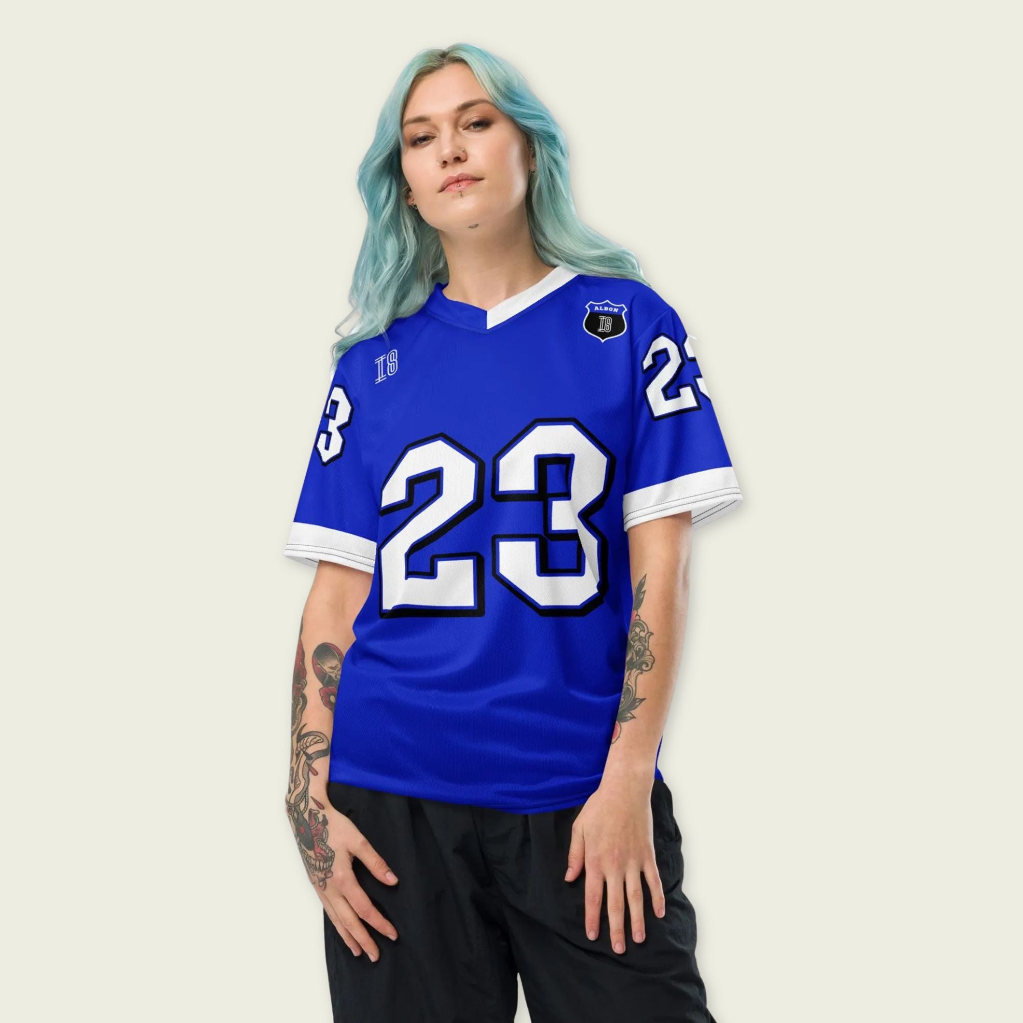 A blue and white football jersey with Alex Albon's Williams F1 racing number 23 on the back and front in white. It has the name Hamilton in red on the front and back as well.