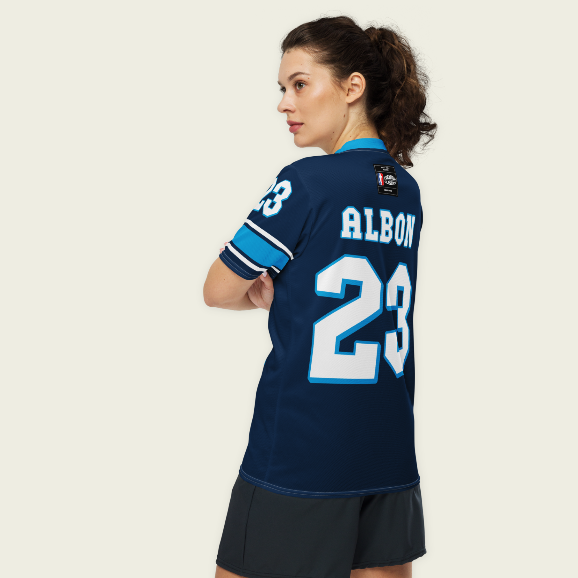 A navy blue football jersey with Alex Albons Williams F1 Racing number 23 on the front and back.