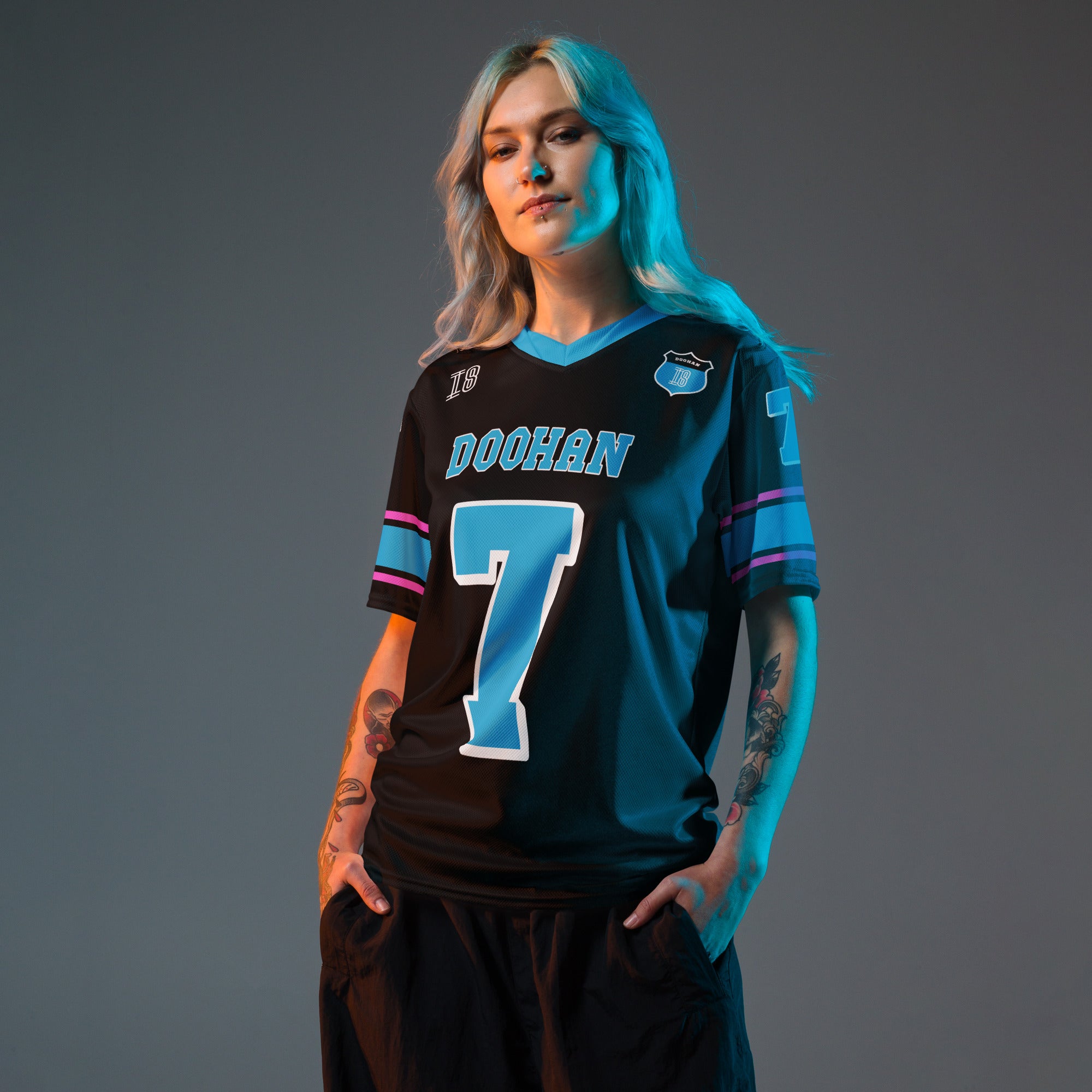 A navy blue football jersey with Jack Doohan's Alpine F1 Racing number 7 on the front and back.