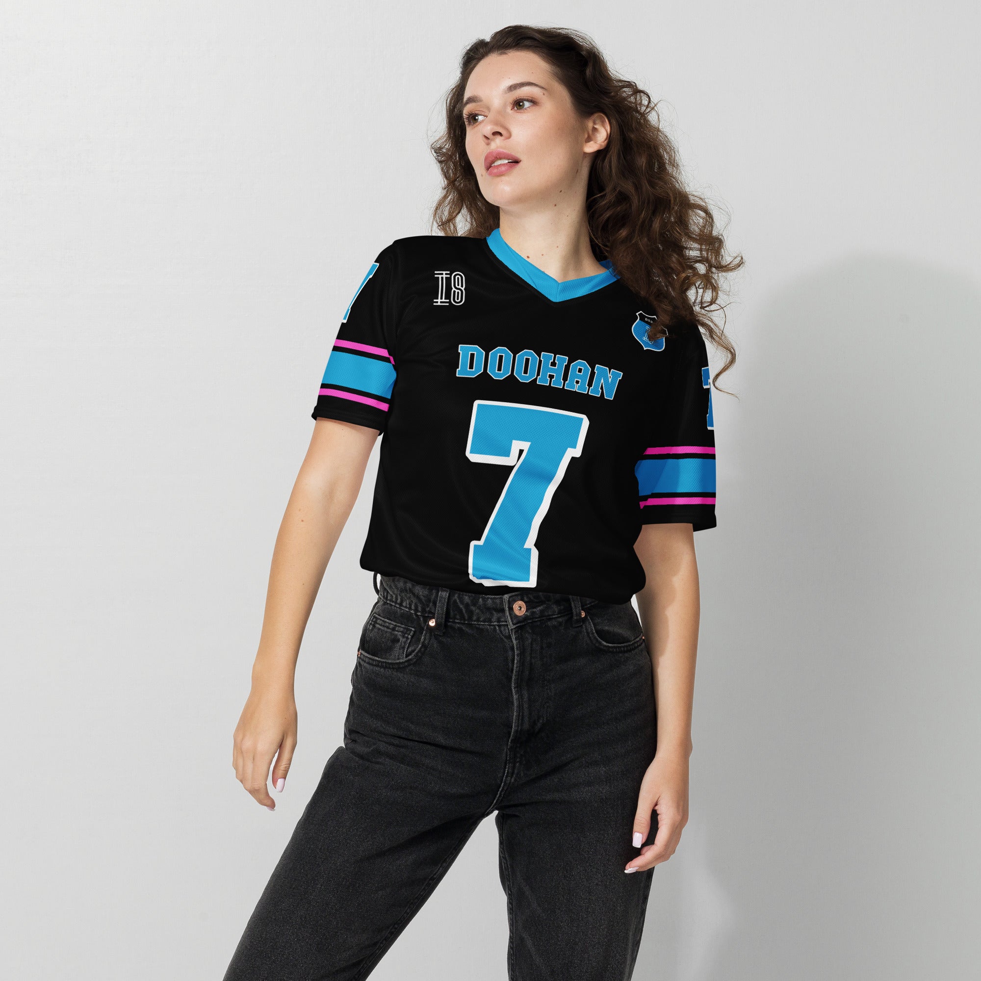 A navy blue football jersey with Jack Doohan's Alpine F1 Racing number 7 on the front and back.