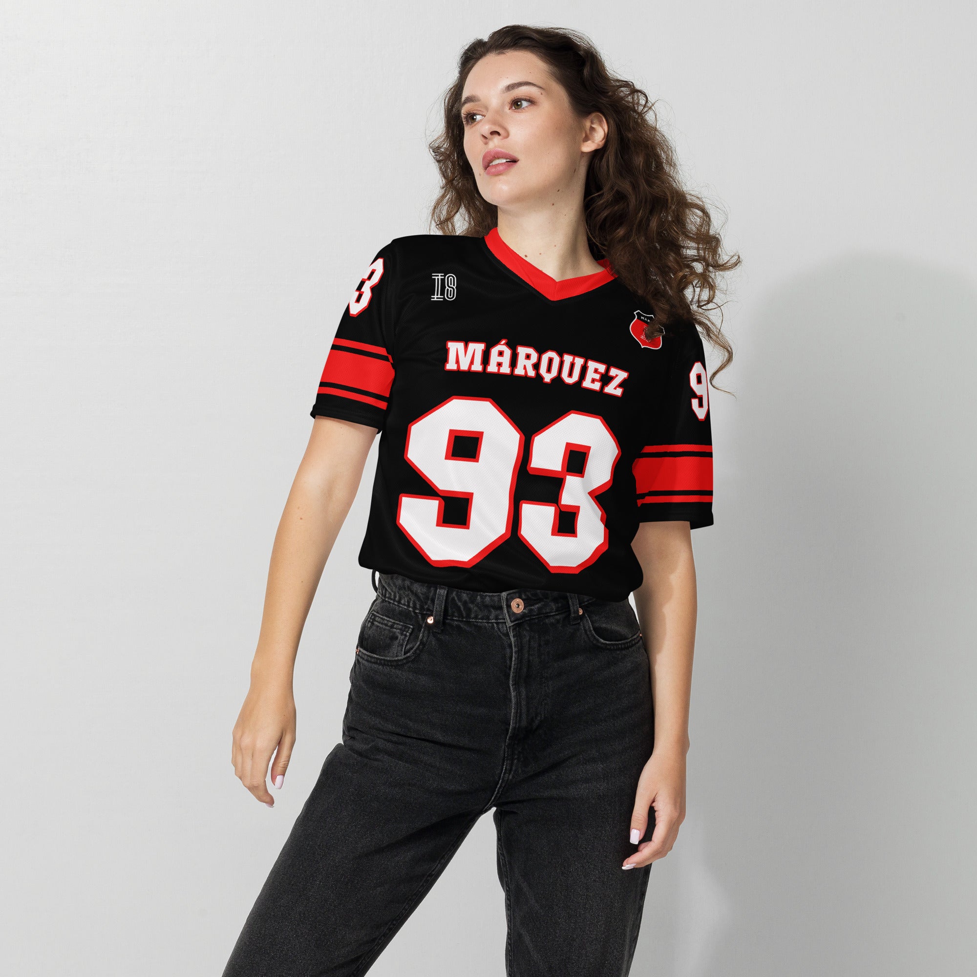 A black and red football jersey with Marc Márquez Moto GP racing number 93 in white with a red outline.
