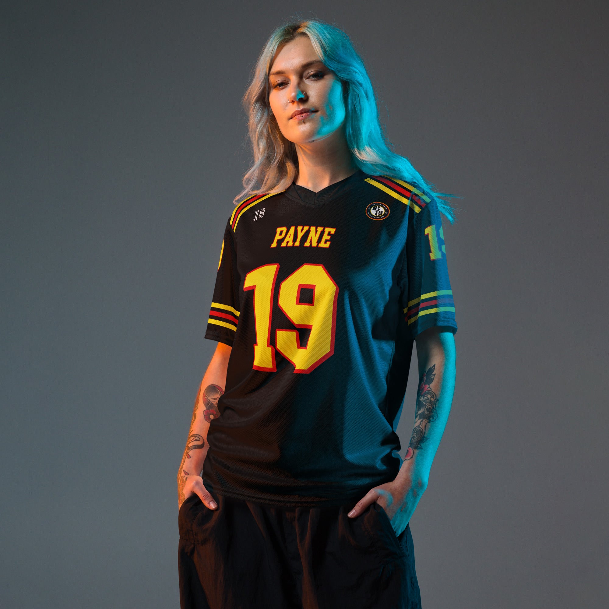 Person wearing a sports jersey with 'PAYNE' and number '19' on a gray background