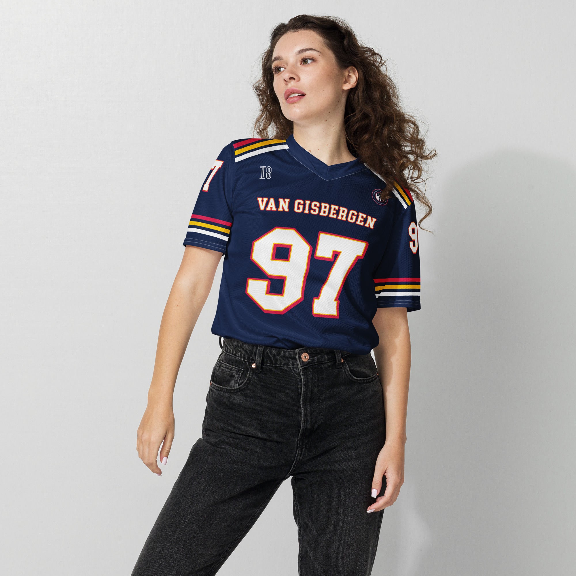 Woman wearing a navy blue sports jersey with 'Van Gisbergen' and number '97' on a plain background