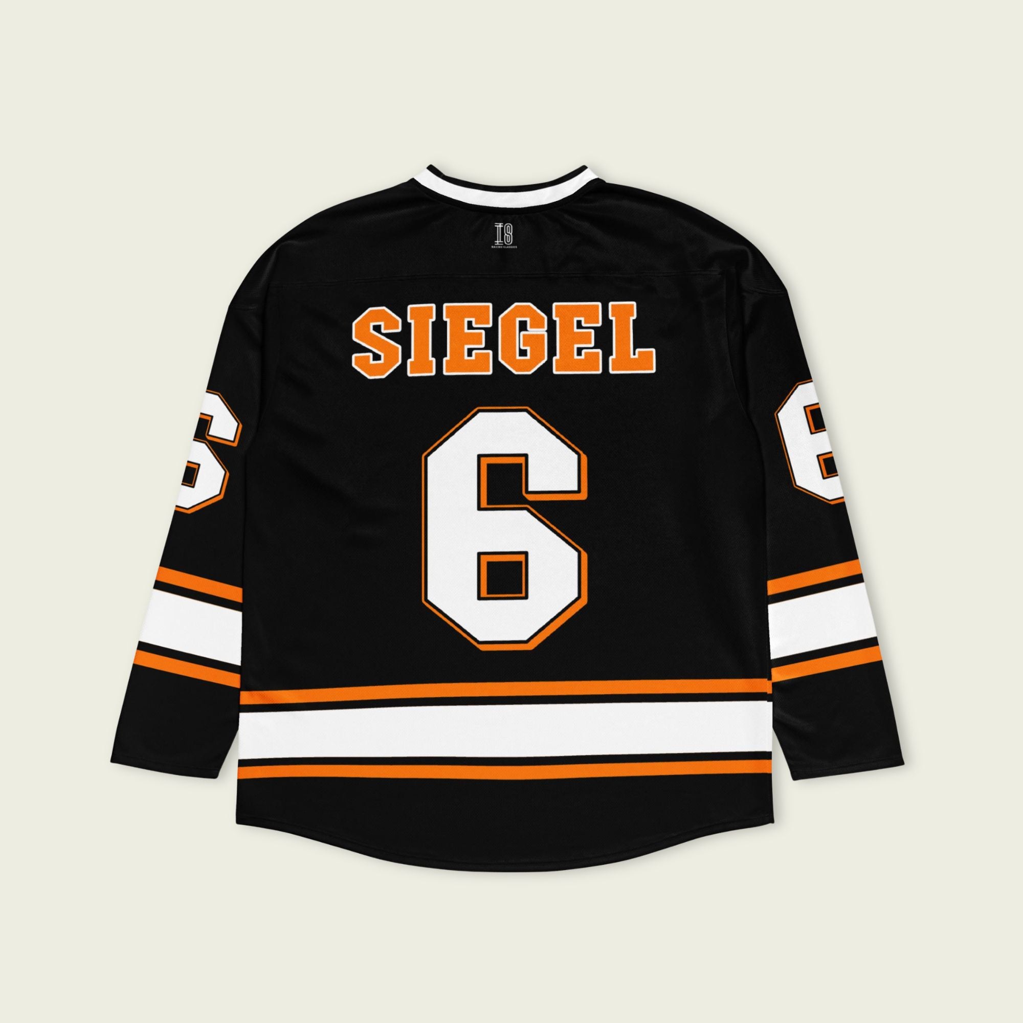 Black hockey jersey with 'SIEGEL' and number '6' on a beige background