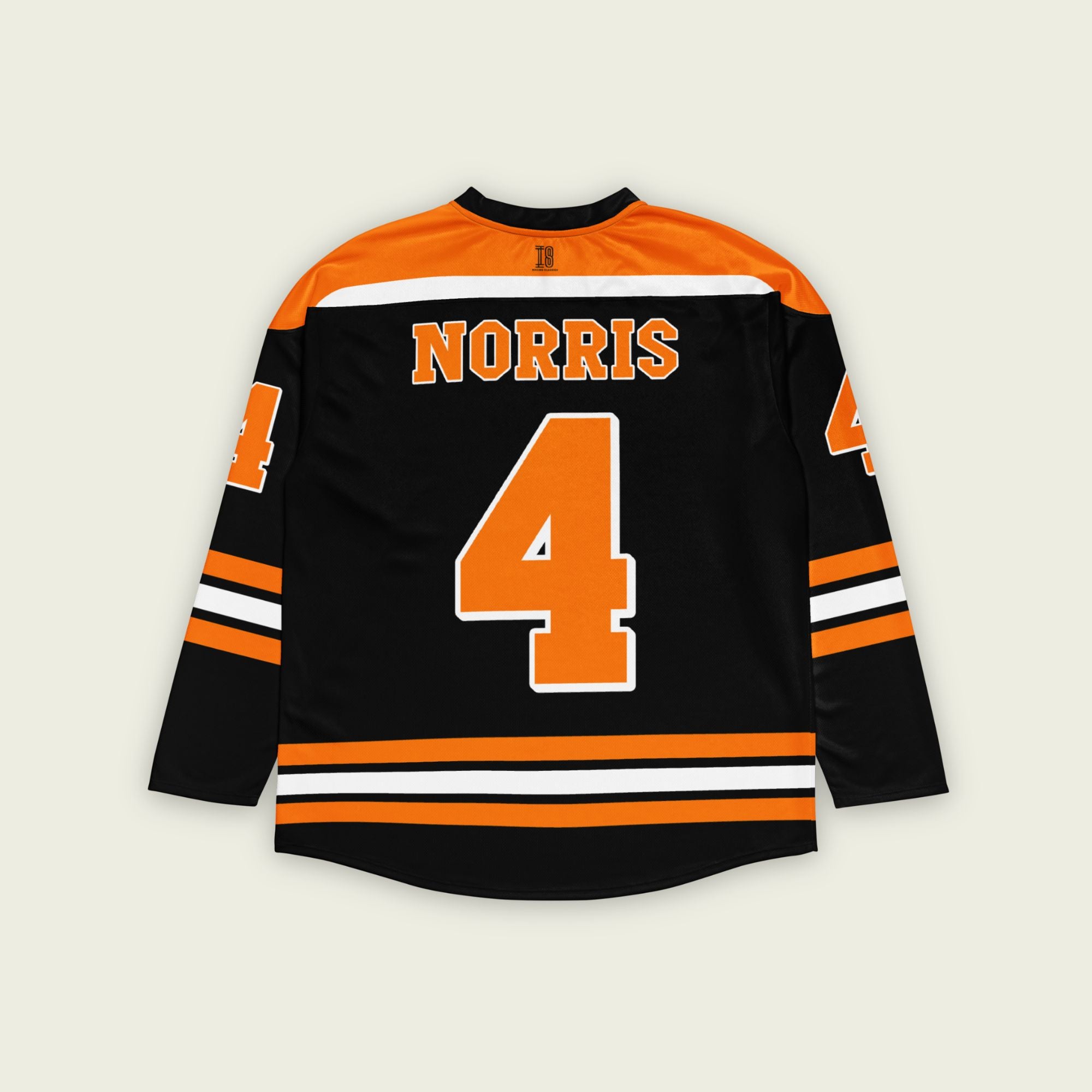 A black hockey jersey with lando norris's mclaren F1 racing number 4 on the front and the black. it has oragne stripesin the top, bottom, and arms. WIth his last name norris on the front and back.