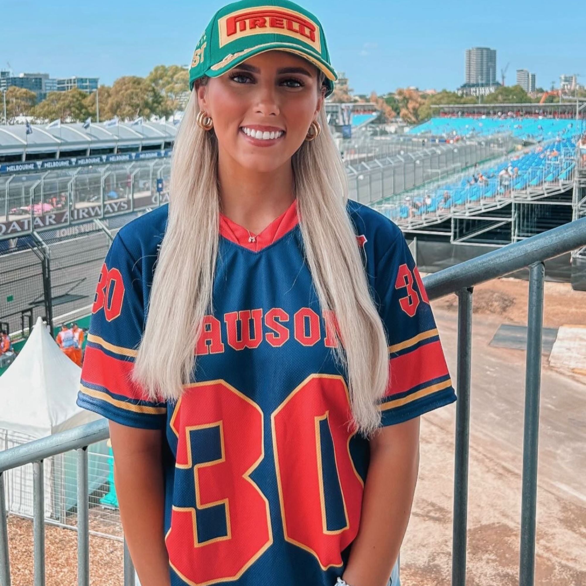 A navy blue football jersey with Liam Lawson Redbull F1 Racing number 30 on the front and back.