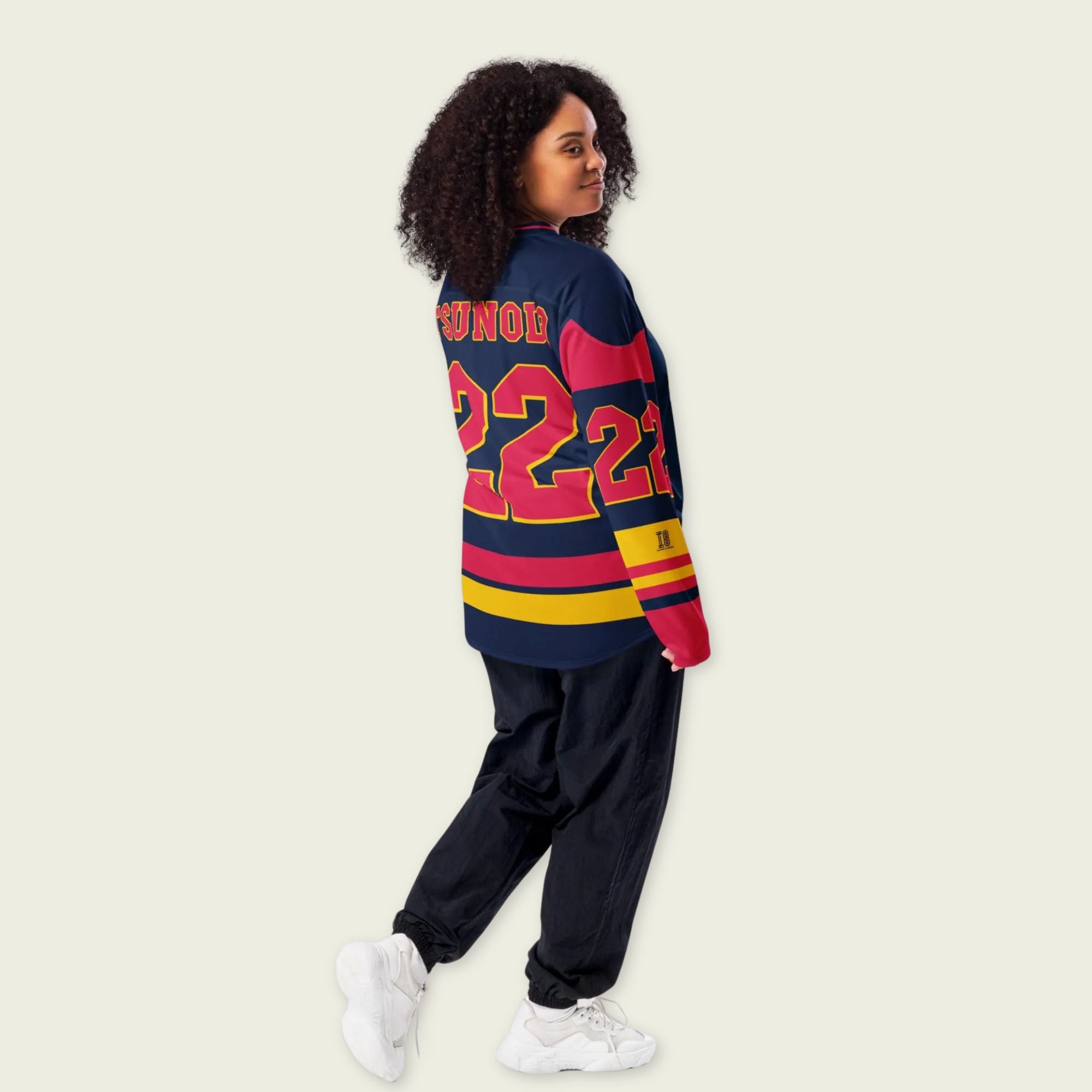 A navy blue hockey jersey with Yuki Tsunoda redbull F1 racing number 22. It has the name Tsunoda on the back and front.