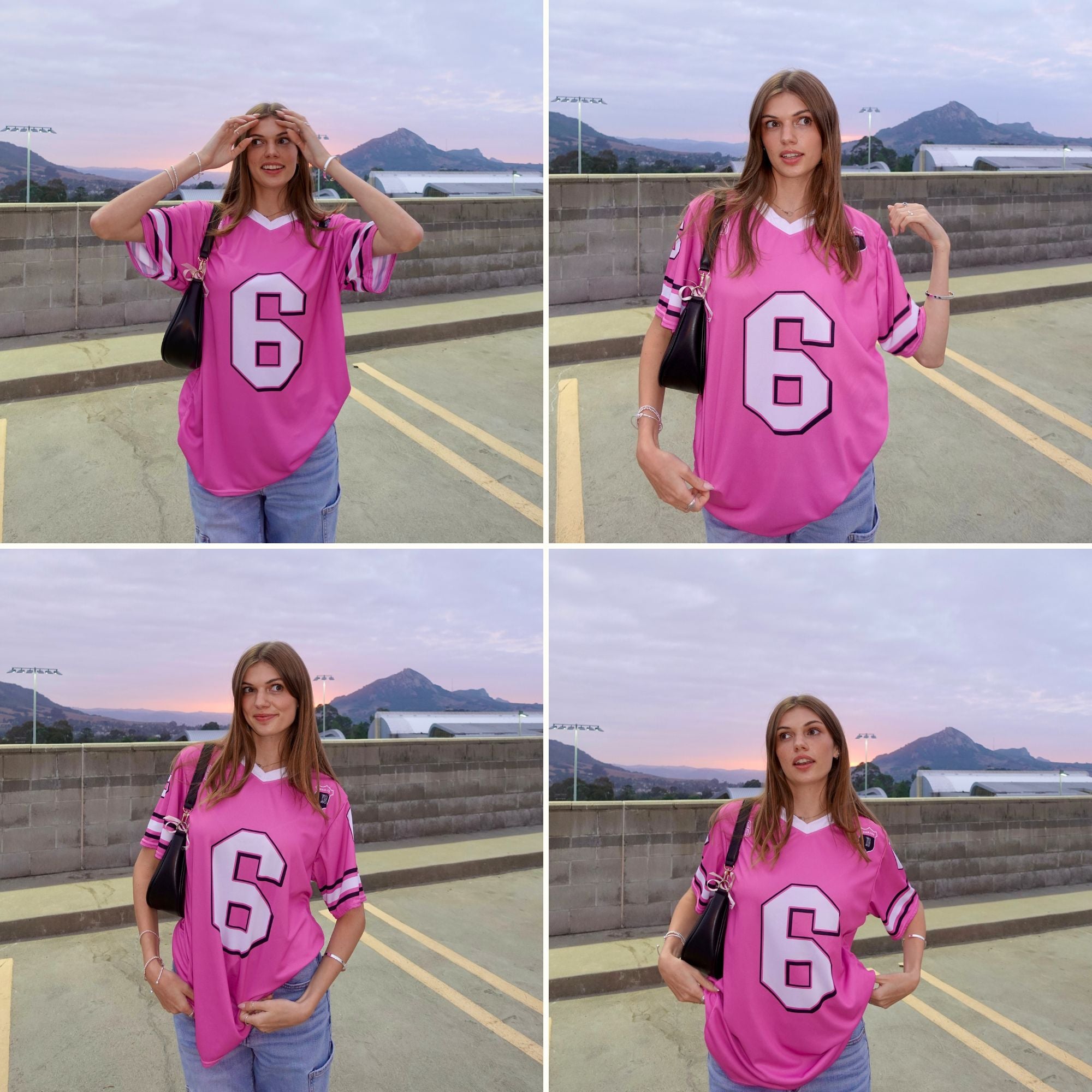 Woman wearing a pink jersey with the number 6 in a parking lot with mountains in the background.