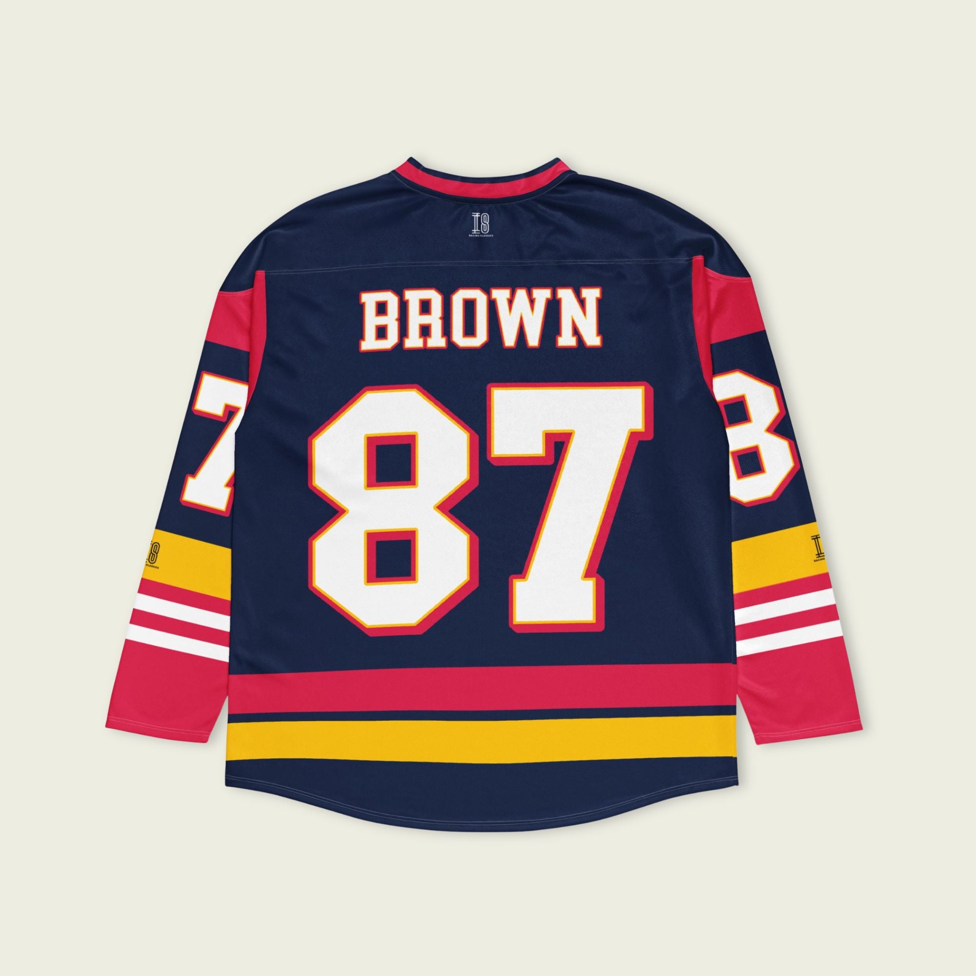 Hockey jersey with 'Brown' and number '87' on a beige background