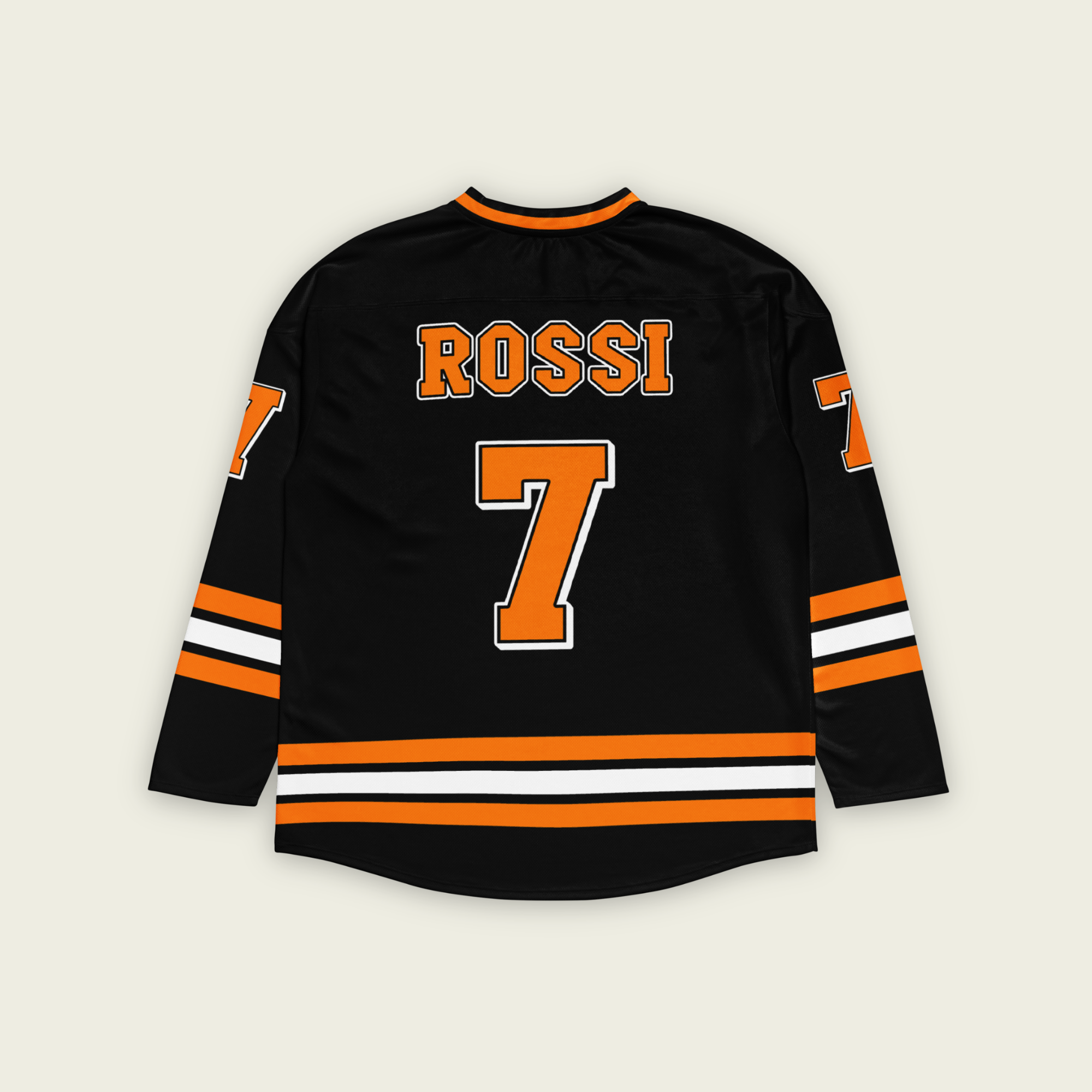 A black and orange hockey jersey with Alexander Rossi's indycar racing number 7 on the front and back in orange. The name of Rossi is on the front and back in orange as well.
