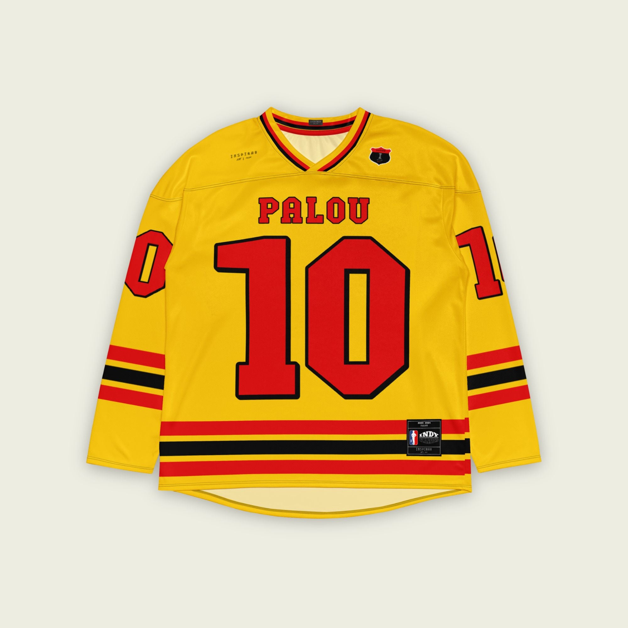 A yellow hockey jersey with Alex Palou's indycar racing number 10 on the front and back in red, also the name palou is on the back and front in red.