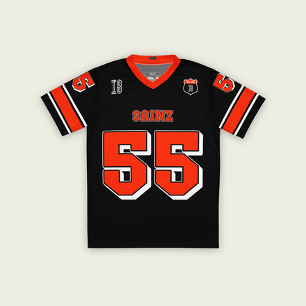 A black and red football jersey with Carlos Sainz Ferrari F1 racing number 55 in red. it has his name saizn on the front and back as well.