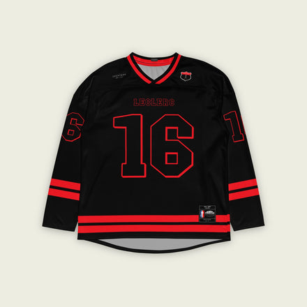 A black hockey jersey with red stripes on the bottom and the arms. It has Charles Leclerc's Ferrari F1 racing number 16 on the front and the back with the name Leclerc just above each number