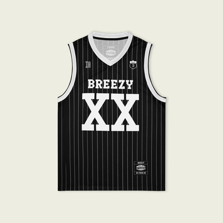 A black and white pin striped basketball Jersey with Chris Brown's Breezy name on the front and back and XX for his 11-11 tour in white, both on the front and back. 