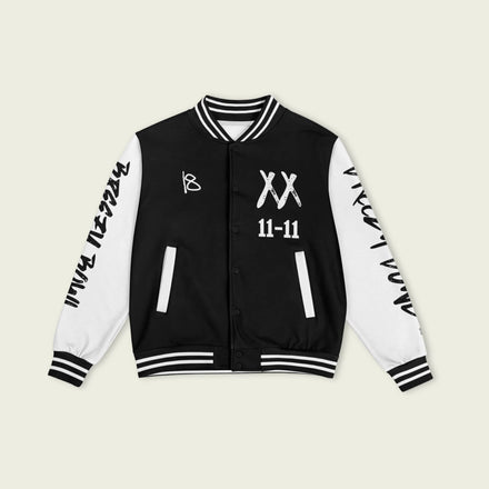 A black and white varsity jacket showing Chris Browns name Breezy on the back with XX and 11-11 breezy bowl tour