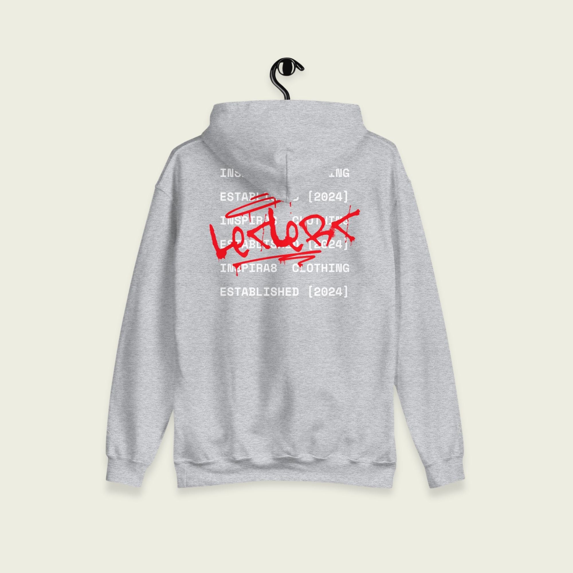 A gray hoodie with text leclerc on the front in grafiti and on the back. With the words inspira8 clothing ltd