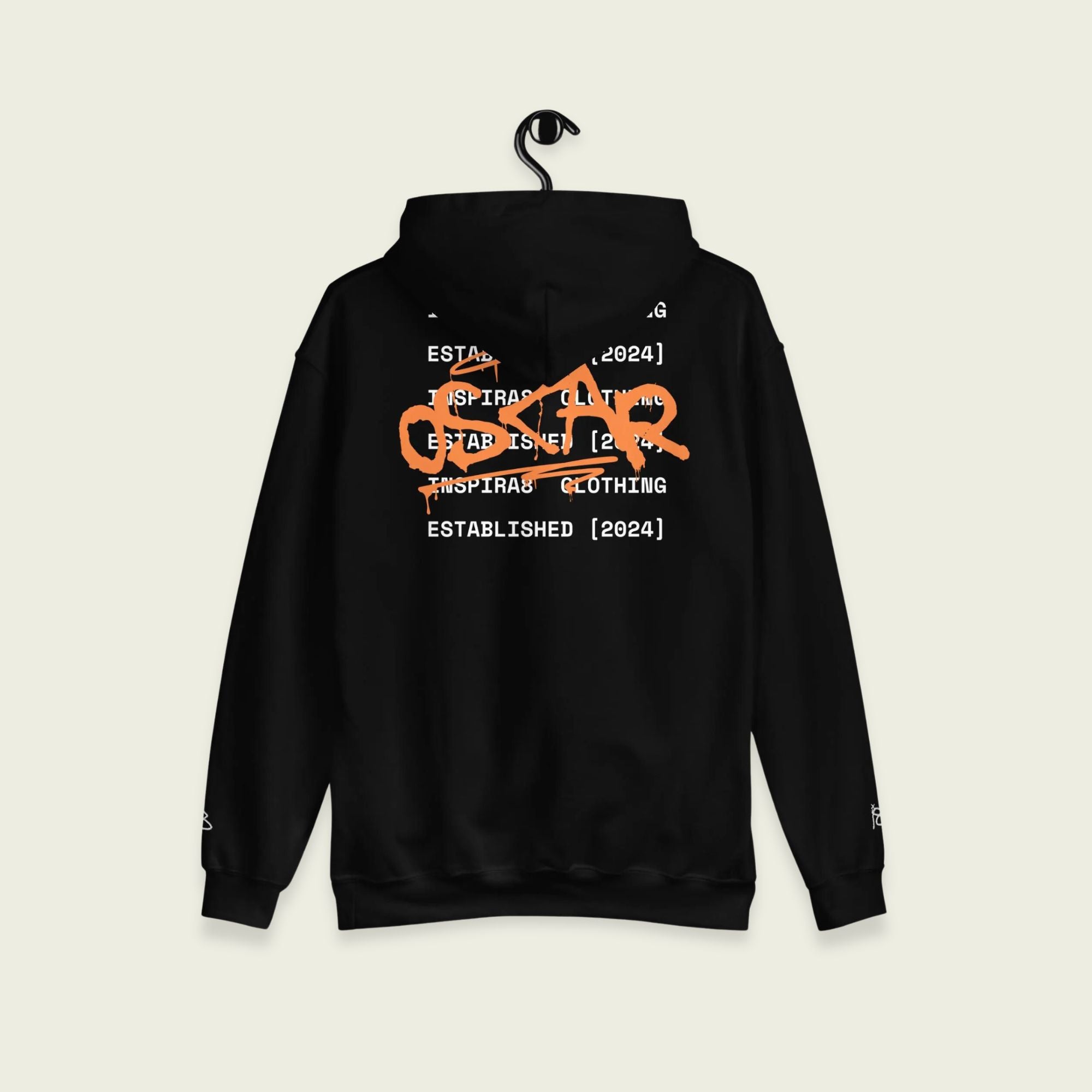 A black hoodie with text oscar on the front in grafiti and on the back. With the words inspira8 clothing ltd