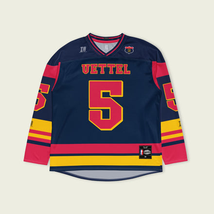 A black hockey jersey with Sebastian Vettel's redbull F1 racing number 5 on the front and the black and the arm.