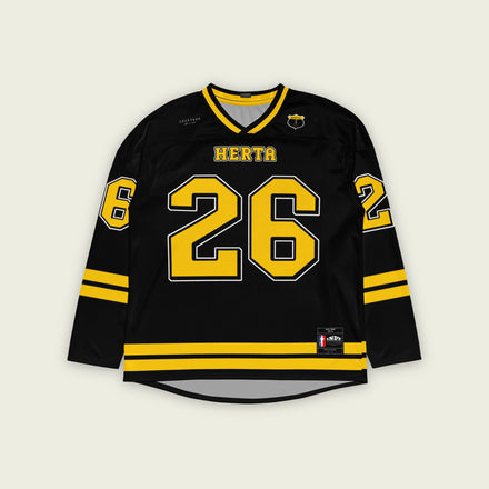 A black hockey jersey with yellow stipes at the bottom and the sleeves. It has the Indycar driver Colton Herta's race number 26 on the front and the back. It also has the name Herta on the front and the back both in yellow with a whilte outline.