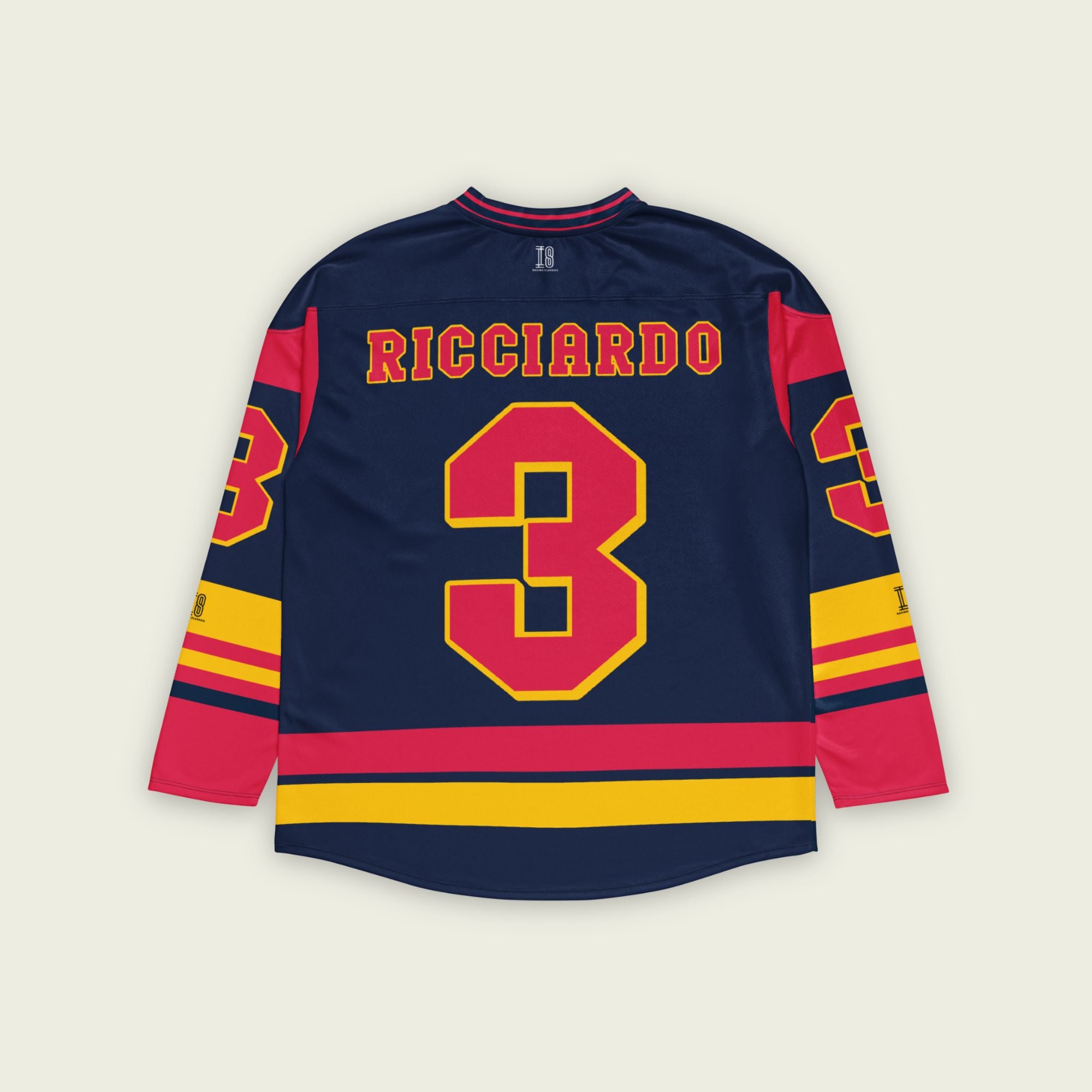 A navy blue hockey jersey with Daniel Ricciardo's Redbull F1 racing number 3 in red on the front and back. It has the name Ricciardo on the back and front in red as well.