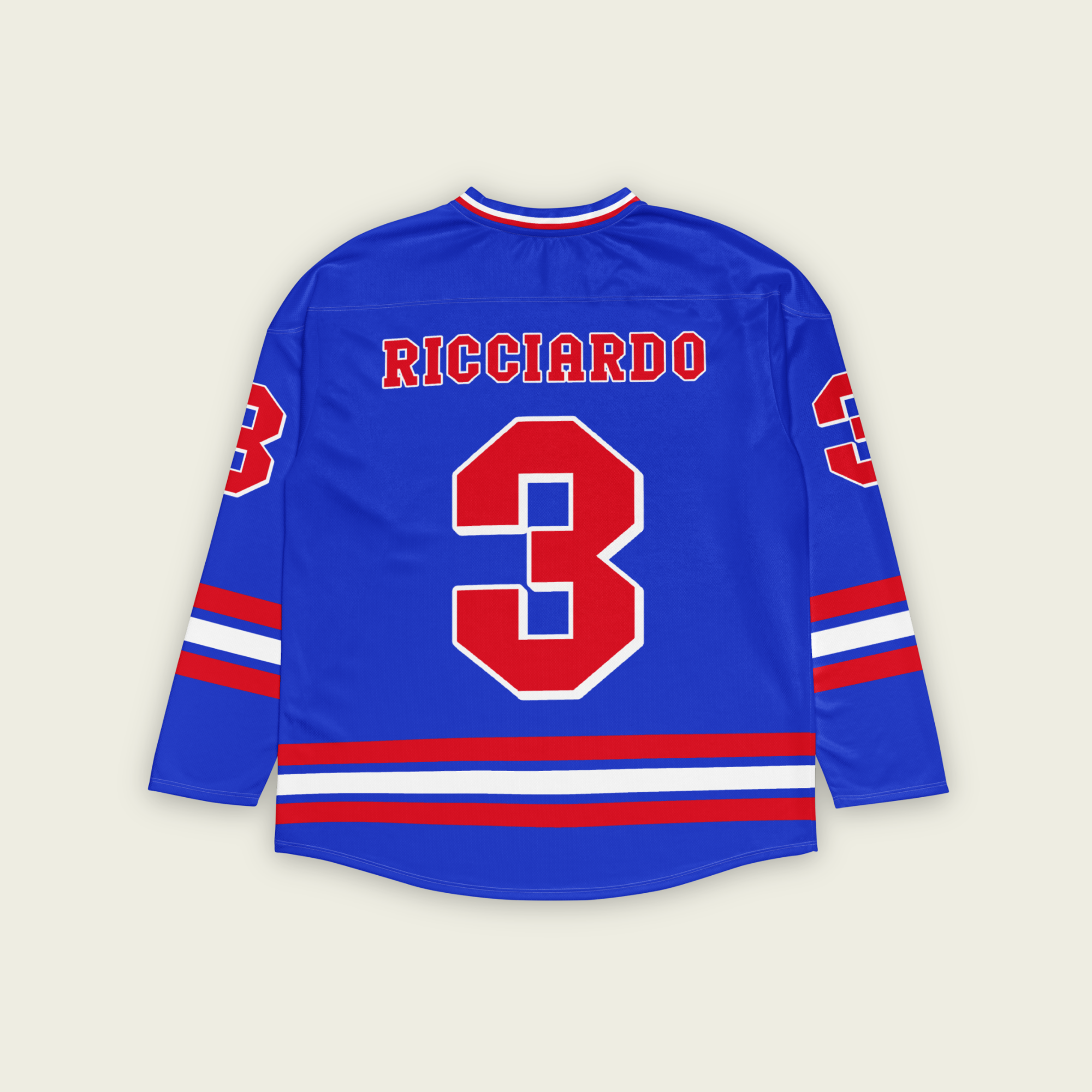 A blue and red hockey jersey with daniel ricciardo's VCARB F1 racing number in red. It has the name Ricciardo on the front and back in red.