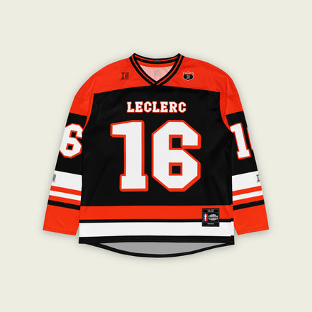 A red and black  hockey jersey with Charles Leclerc's Ferrari F1 racing number 16 in white on the front and back. It has the name Leclerc on the back and front in white as well.