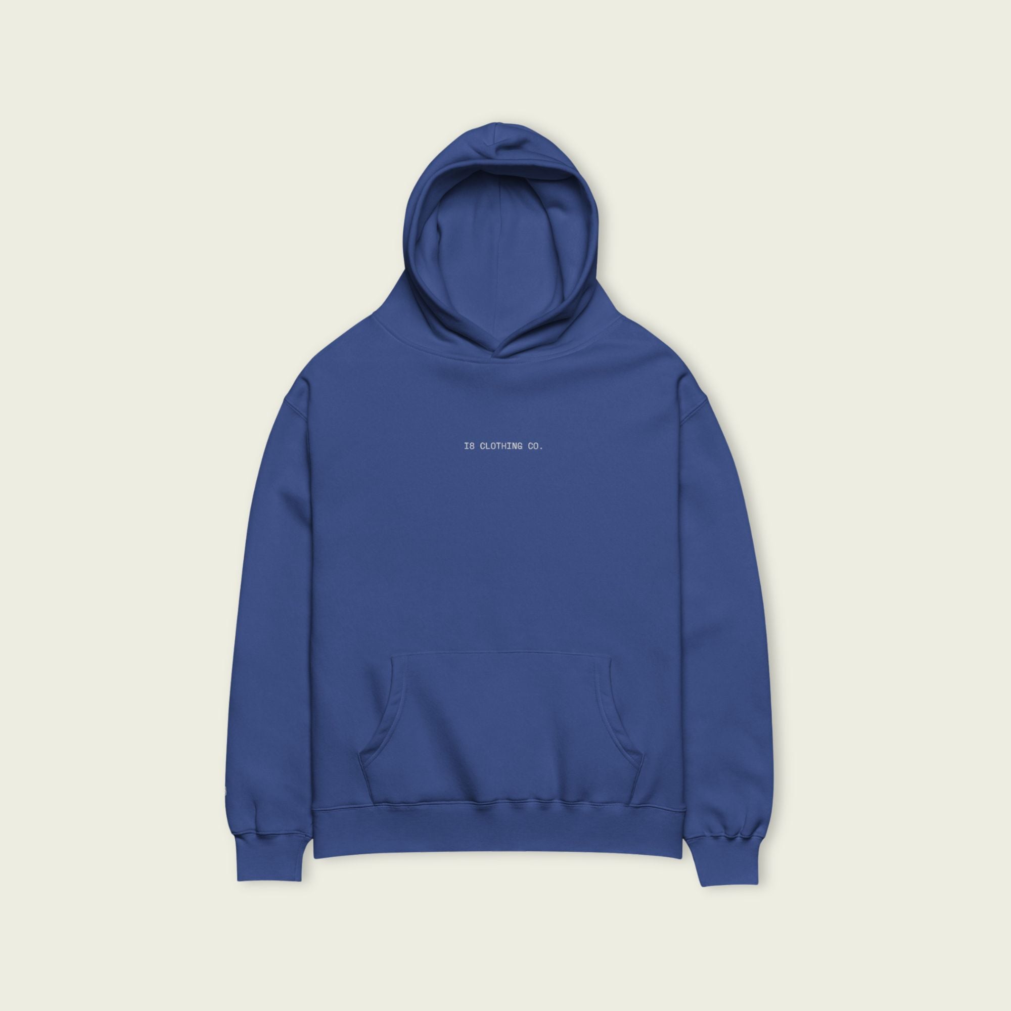 Blue hoodie with text on a beige background