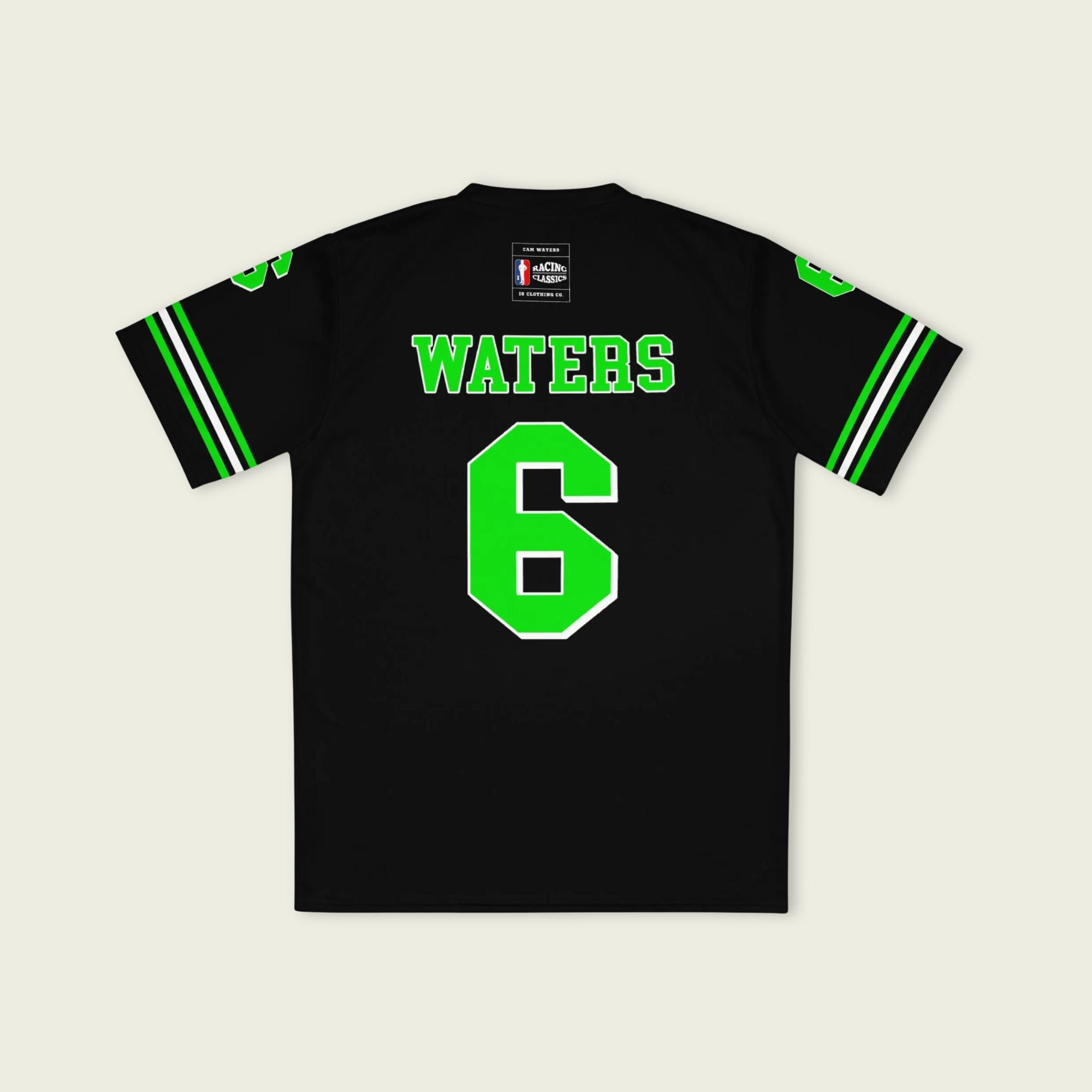 Black sports jersey with green lettering and number on a beige background