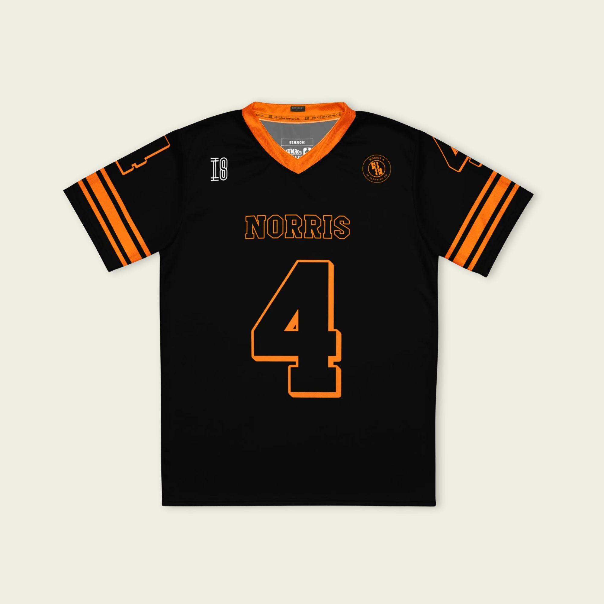 Black sports jersey with orange accents and 'Norris 4' printed on a light gray background