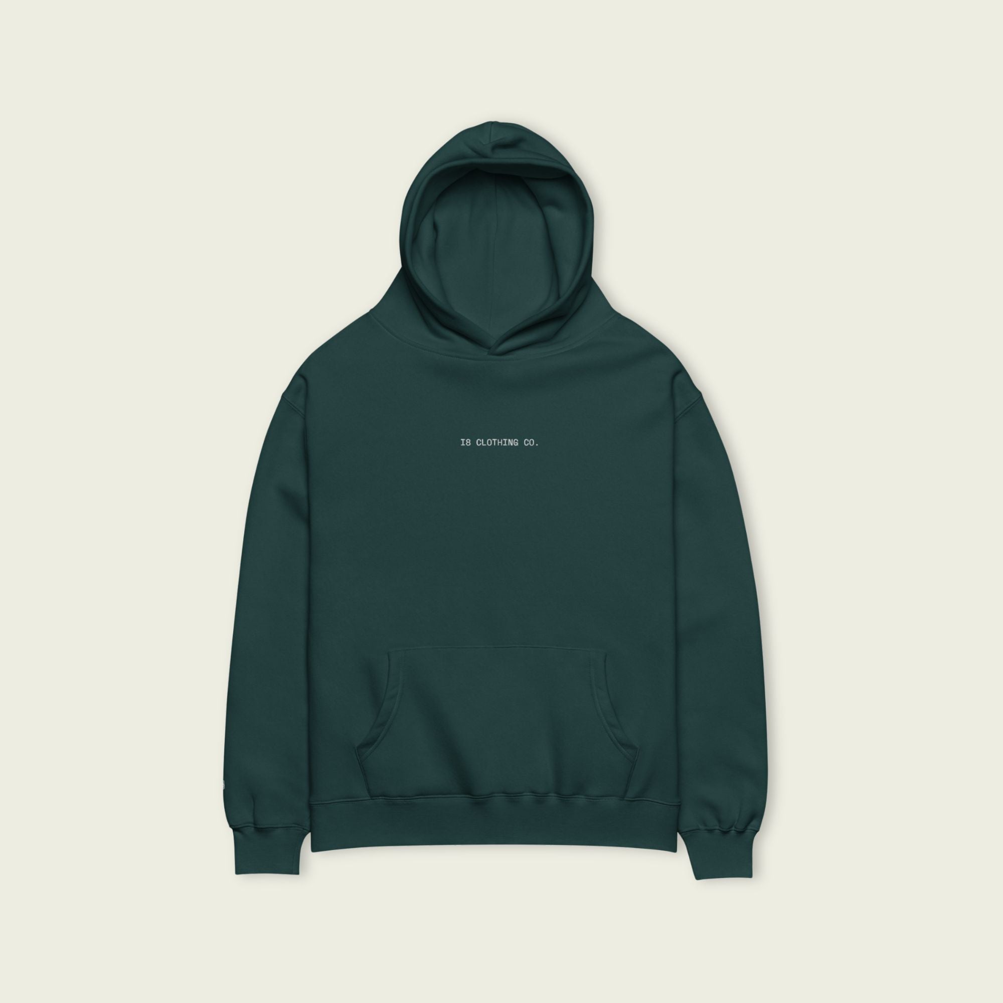 Green hoodie with text on a beige background