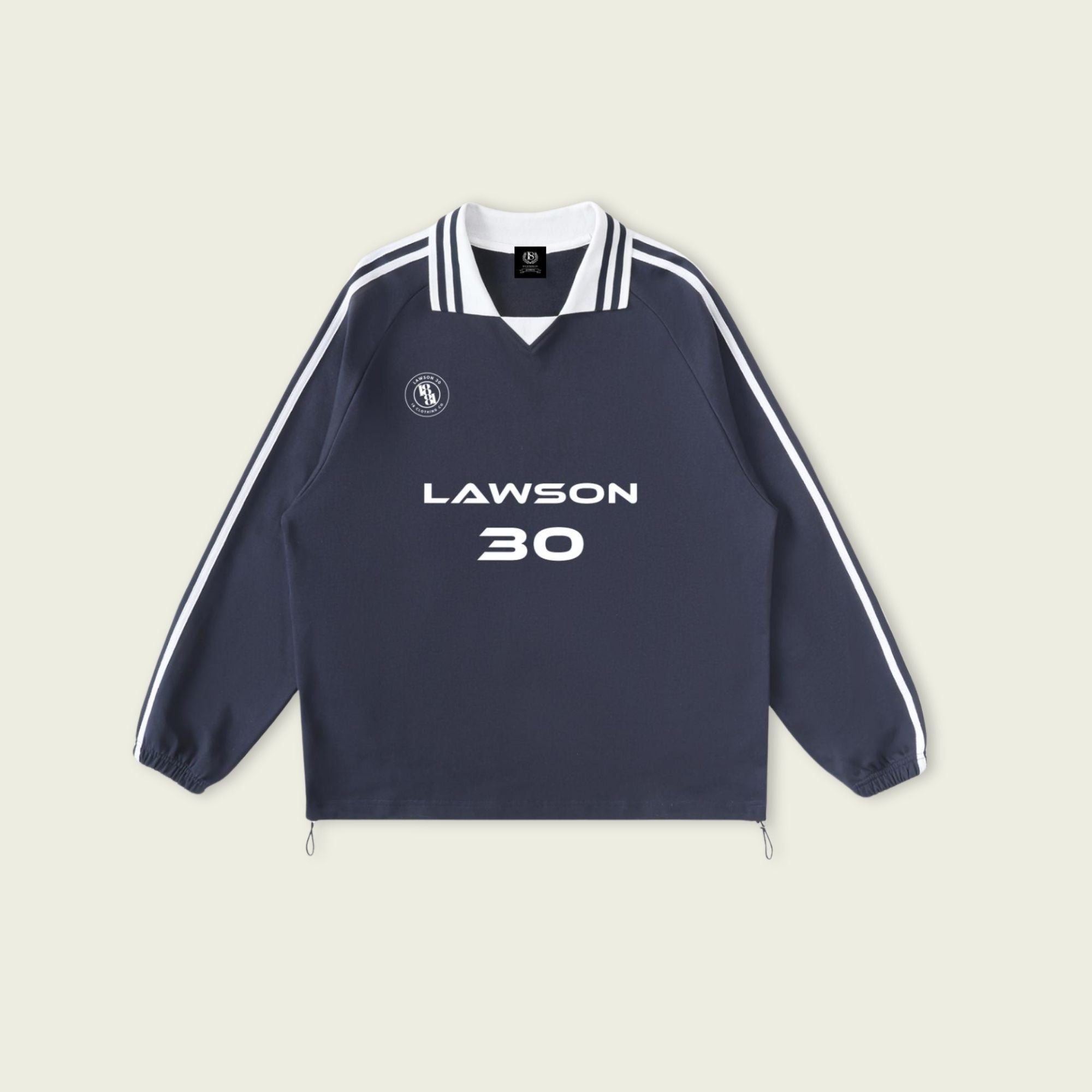 Navy sports jacket with white accents and 'Lawson 30' text on a beige background