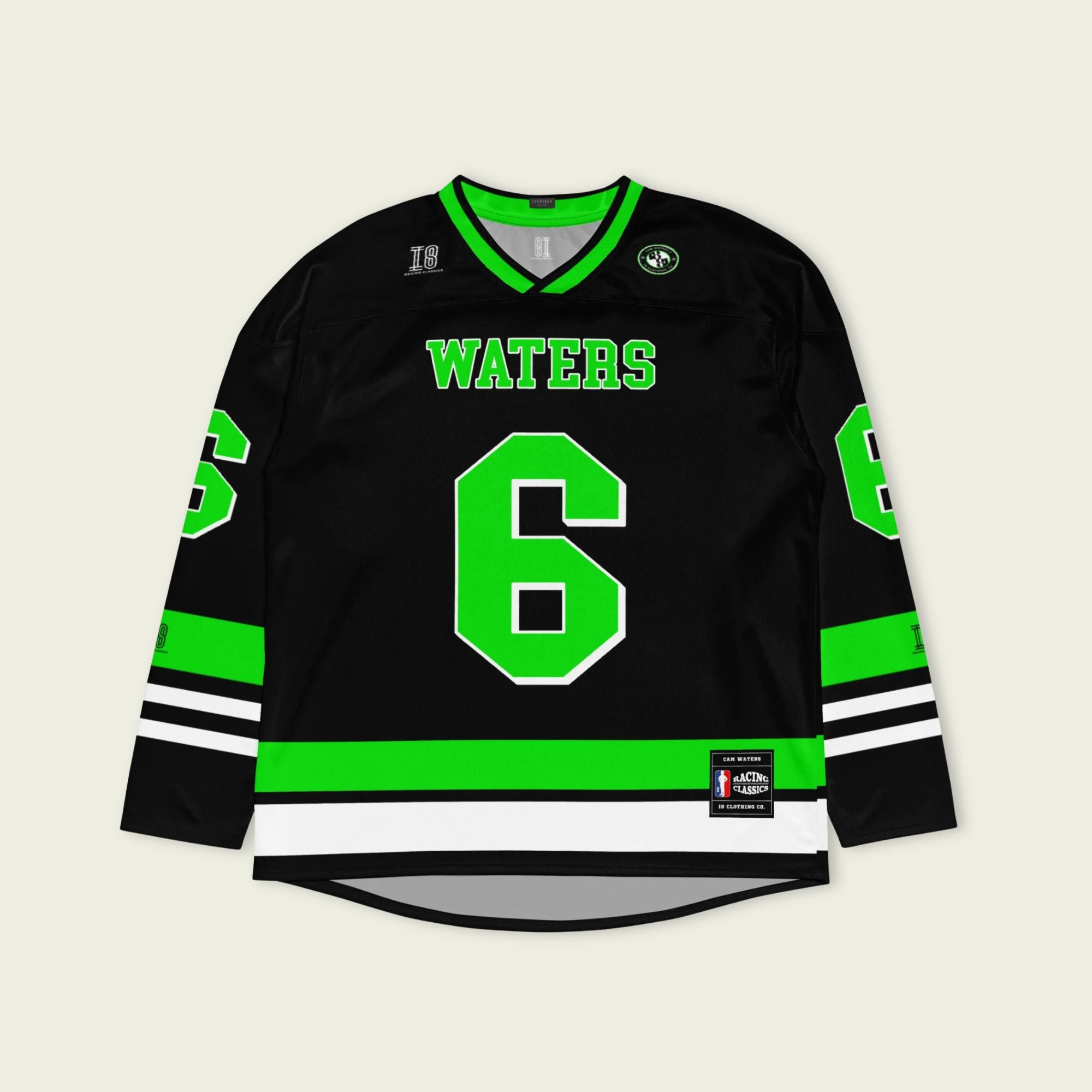 Black hockey jersey with green and white accents featuring the name 'WATERS' and number '6'.