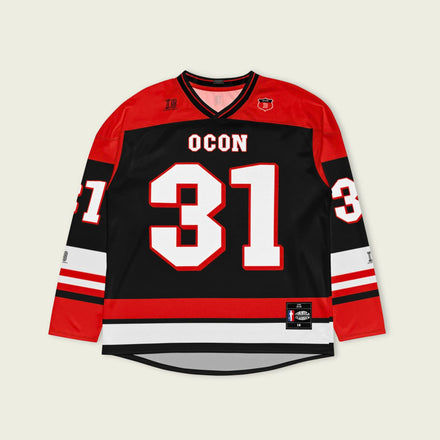 Hockey jersey with red, black, and white colors on a beige background