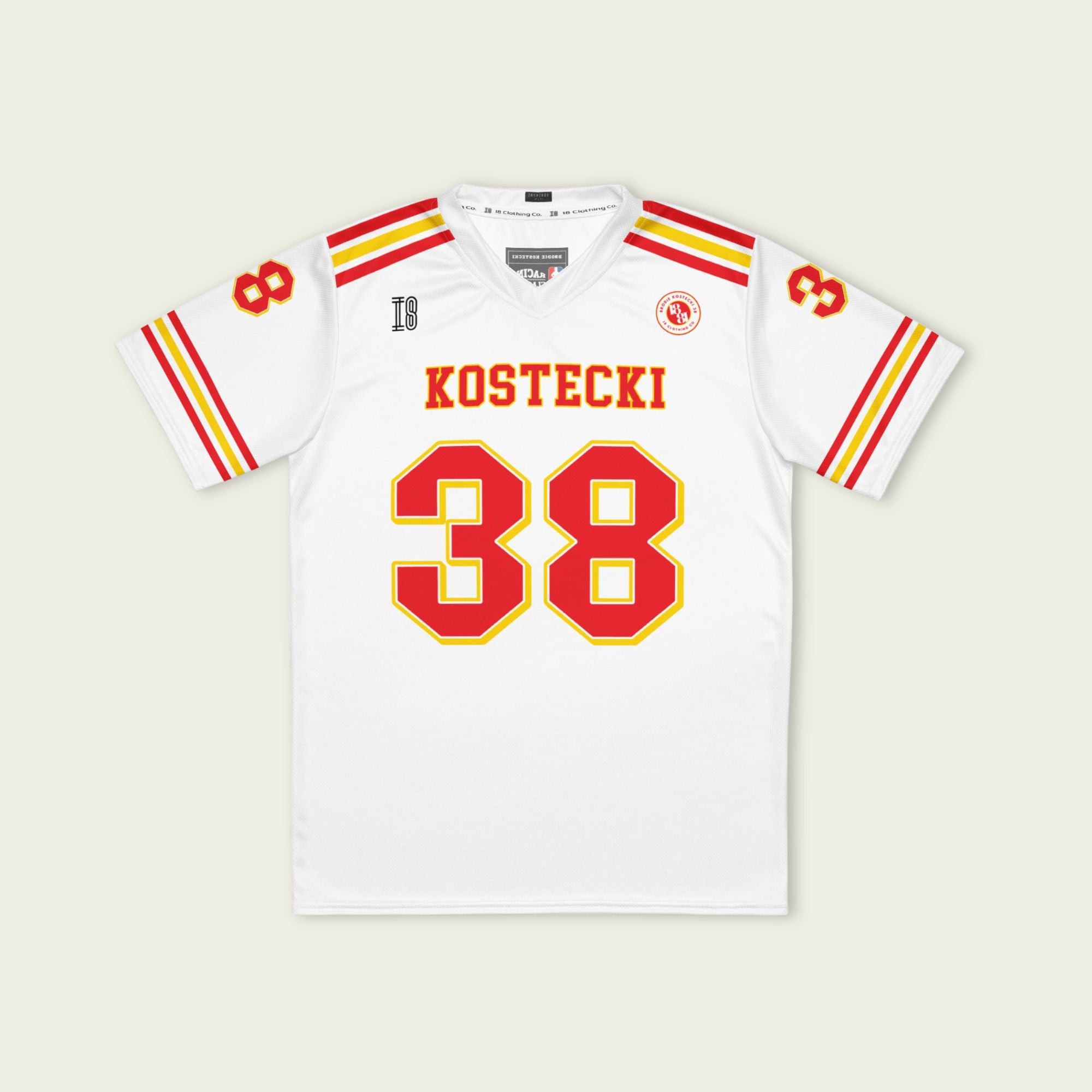 White sports jersey with red and yellow accents featuring the name 'Kostecki' and number '38'.