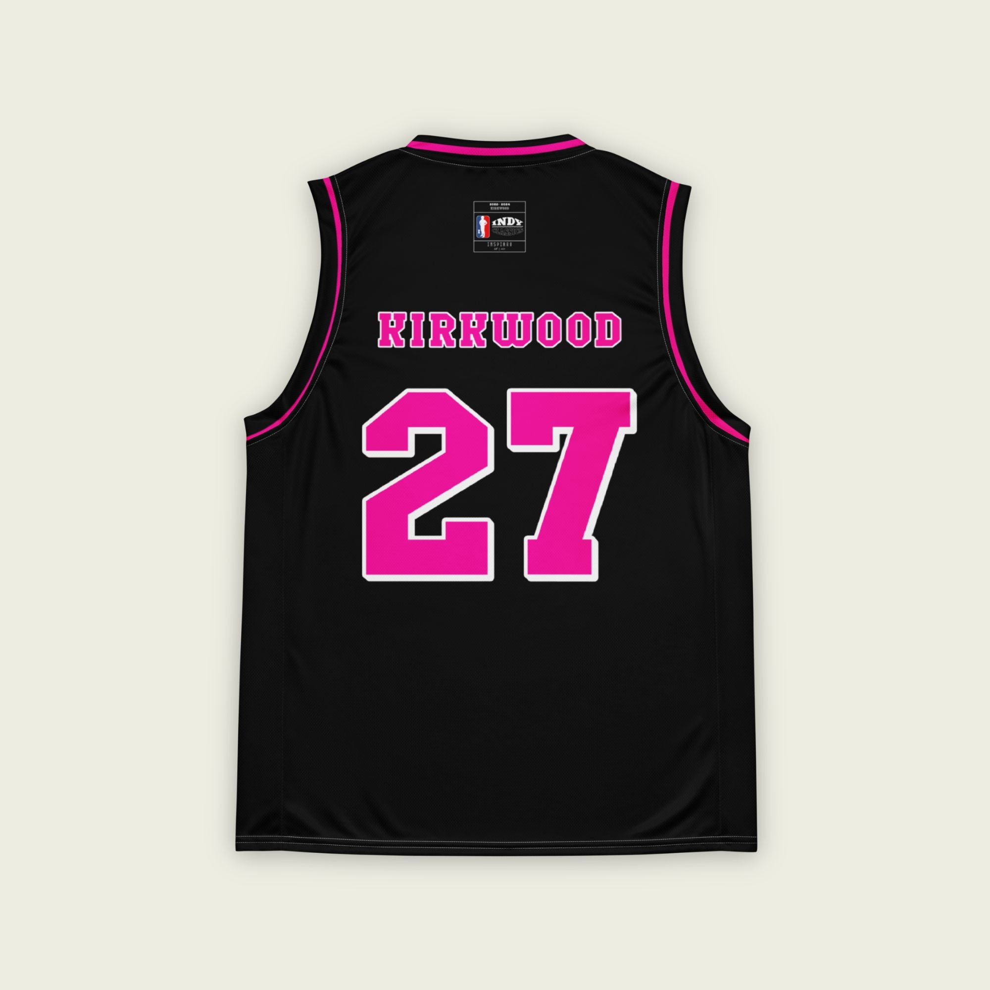 A black and pink basketball jersey with Kyle Kirkwood's Indycar racing number 27 on the front and back.
