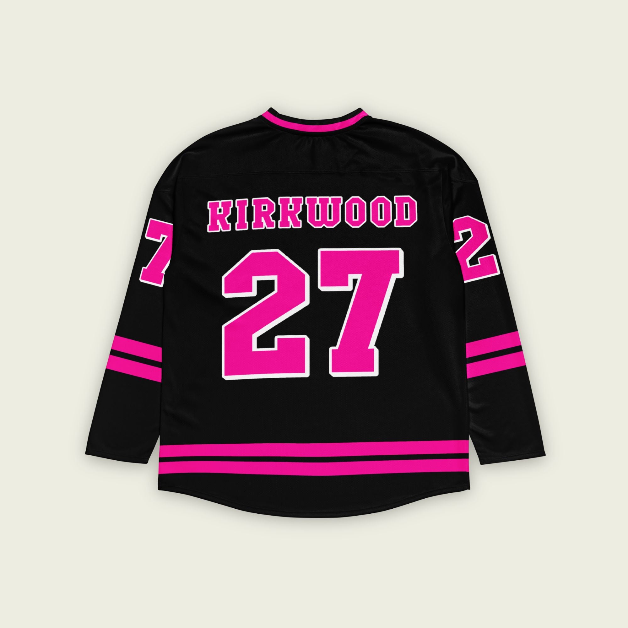 A black hockey jersey with pink stripes on the bottom and the armes, with Kyle Kirkwood's indycar racing number 27 on the arms, back, and front. The jersey also has the name kirkwood displayed on the front and back.